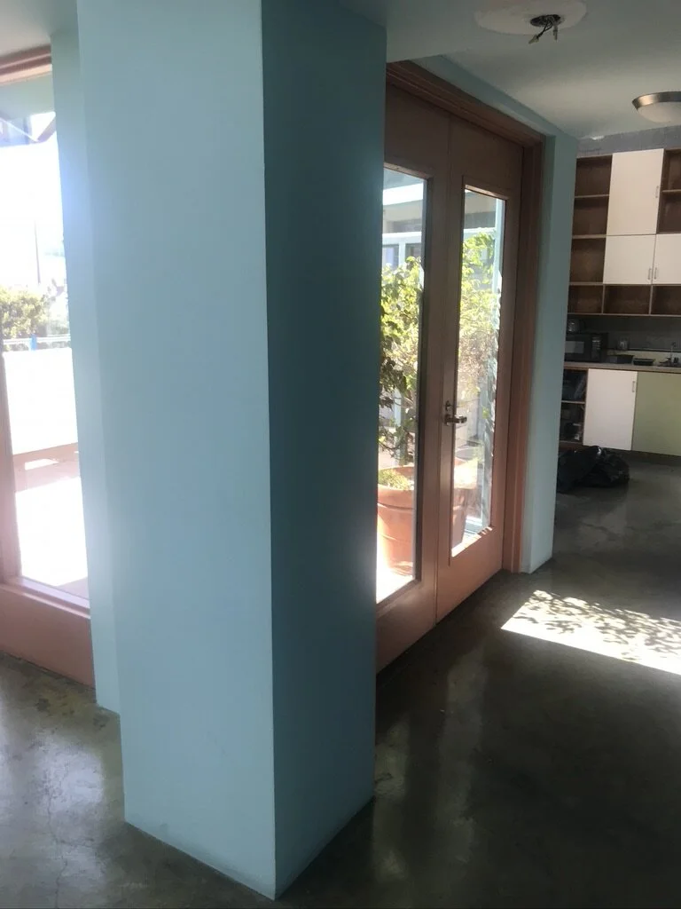 6...  Doors to the spacious patio were unfavorably sequestered in a hallway and hidden from plain view