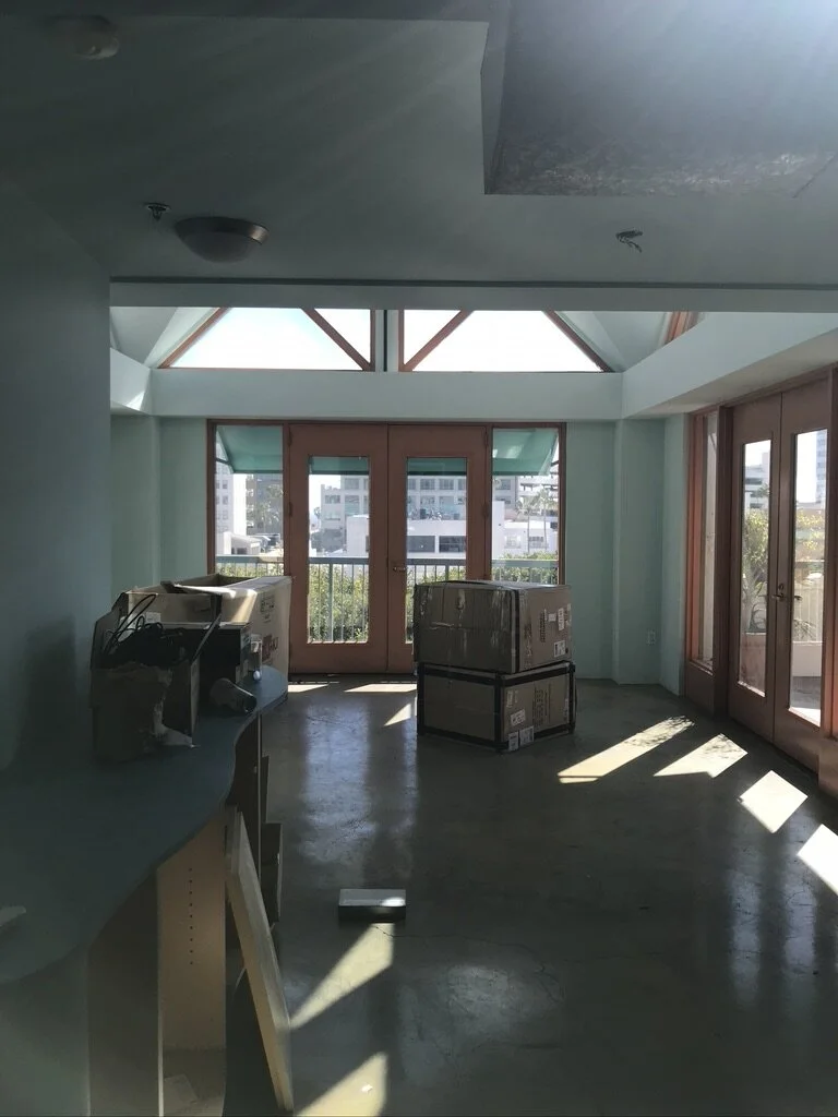 4...  The space was overwhelmed by turquoise walls, mauve-painted trim work and worn and dirty concrete floors