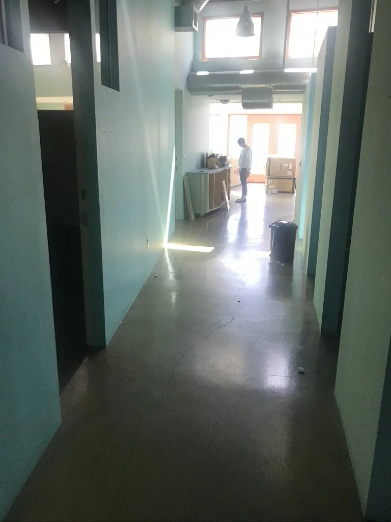 3...  The small space was raw and subdivided into many oddly shaped rooms and nooks.