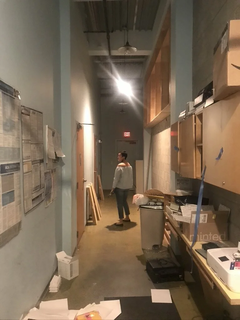 12...  A long narrow storage hallway on one of the side walls seemingly reduced the overall square footage