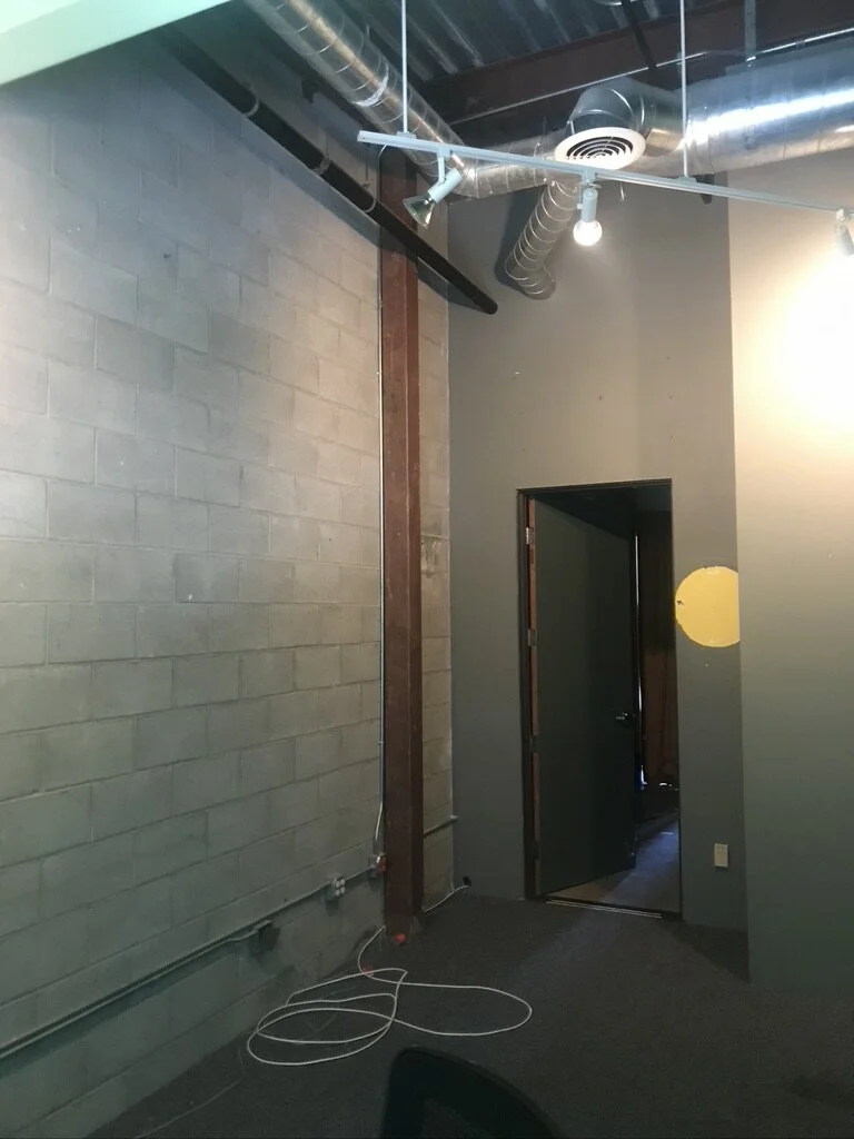 10...  Exposed concrete block flanked either side of the long perimeter walls