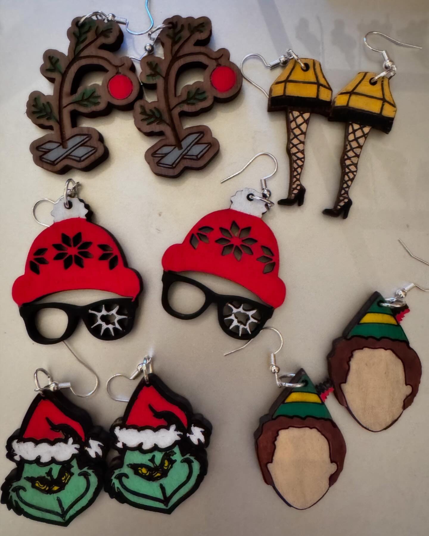 What&rsquo;s your favorite Christmas movie?  I&rsquo;ve been wanting to make earrings for all the popular ones and here&rsquo;s the result!! They&rsquo;re $20 each. Light weight and hand painted. Message or text for orders 704-280-6132