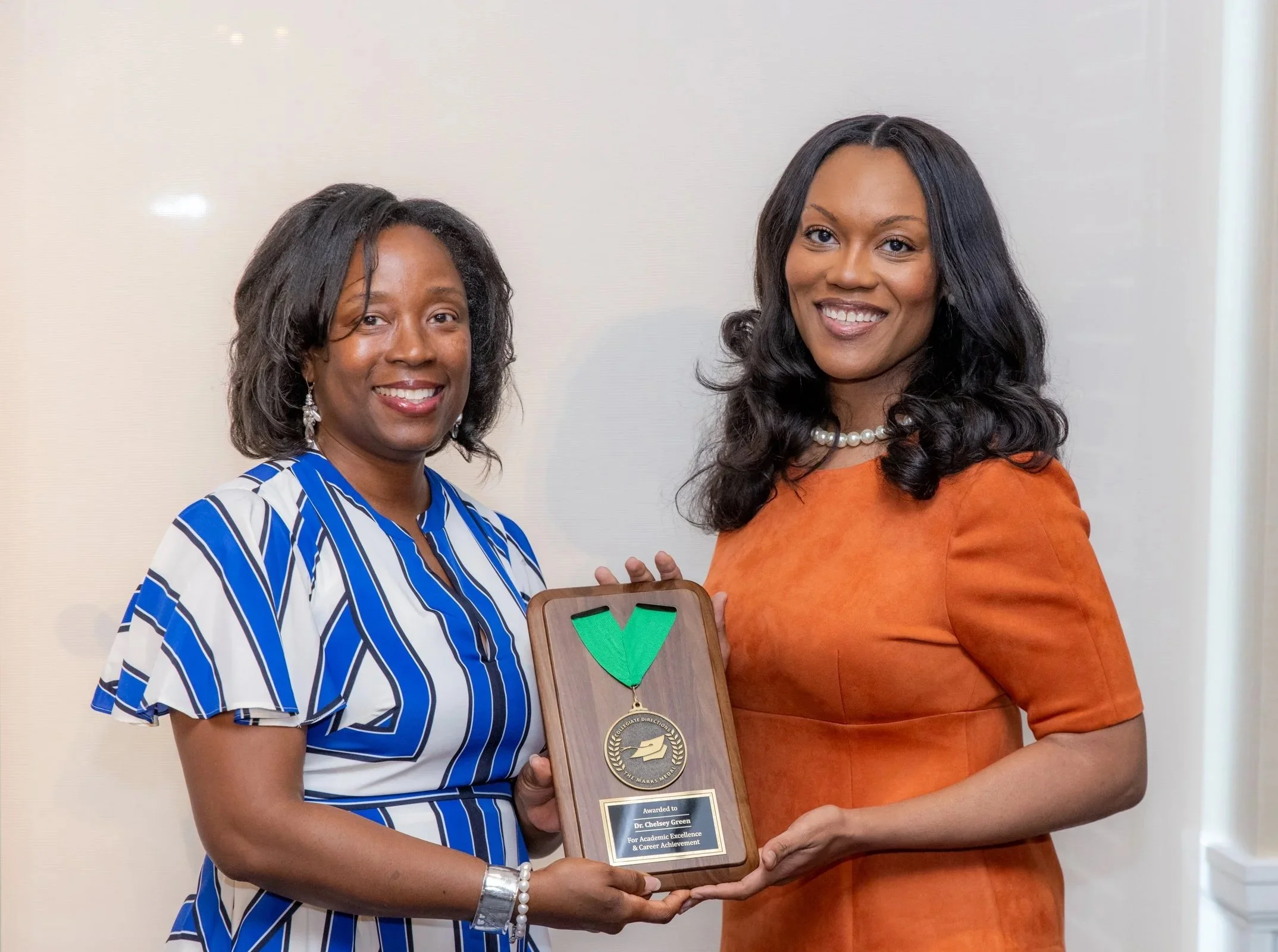 2026: Dr. Chelsey Green receives the Marks Medal from CDI President and CEO Amma Felix.