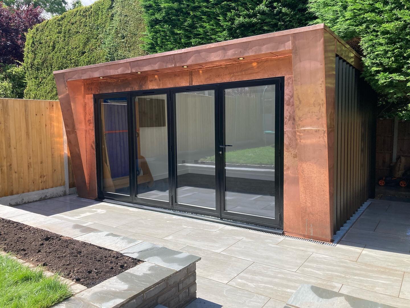 Extraordinary results✅ Antique copper clad garden room with black metal box cladding and bi-folding doors. Fully insulated with positive input ventilation and underfloor heating. Now that&rsquo;s special 👌