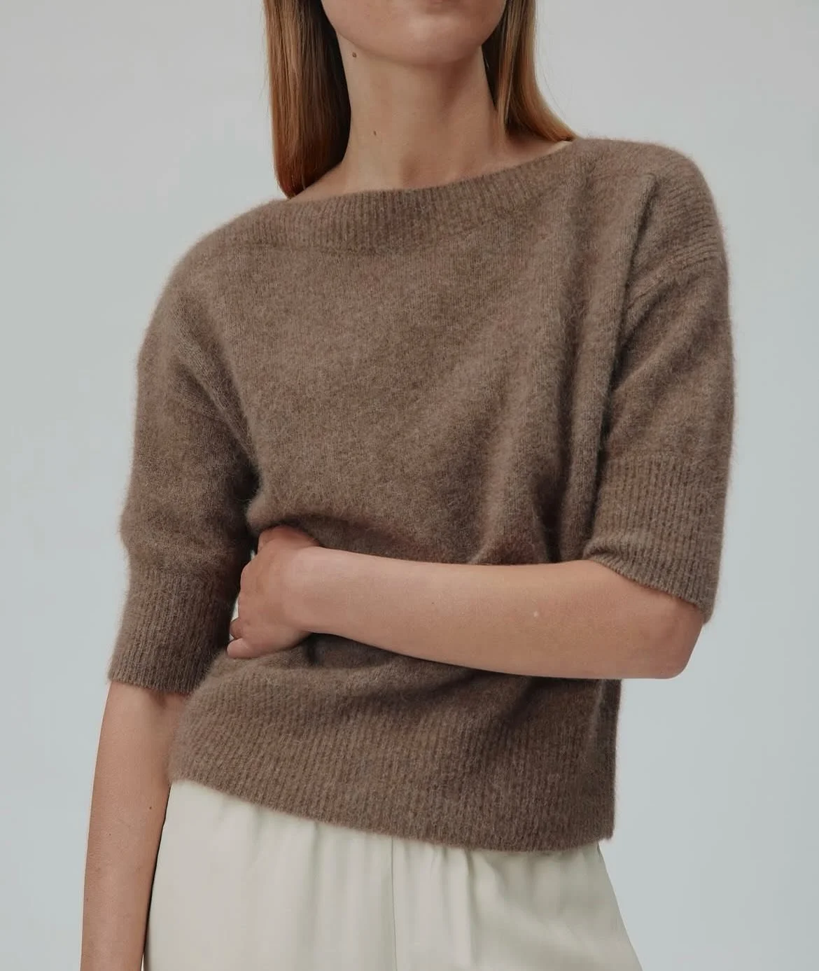 Six &Aacute;mes Moi Sweater. Moi is a timeless sweater in 100% ultra-soft Raccoon Wool with a loose fit and an elegant boat neckline. The elbow-length sleeves and ribbed details at the neckline, hem, and cuffs add subtle structure. Luxuriously soft a