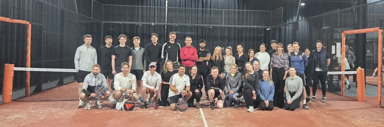 Group photo of padel + play event