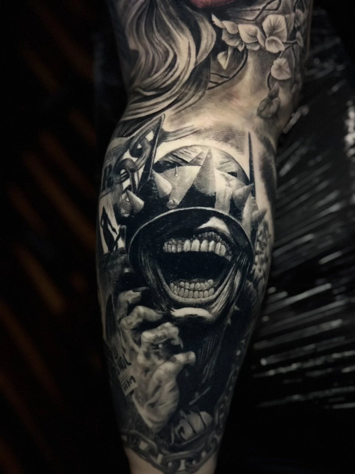 Black-and-grey dark crowned portrait tattoo by Scott Flanders