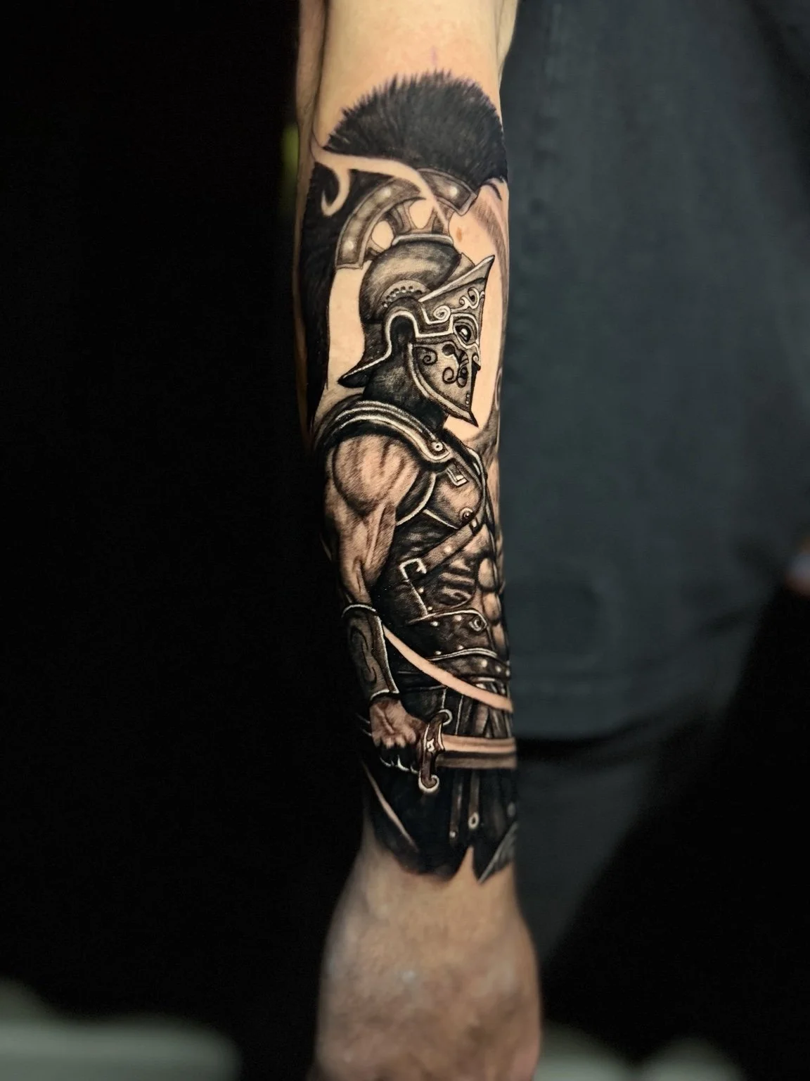 Black-and-grey armored warrior tattoo by Damian Marinelli