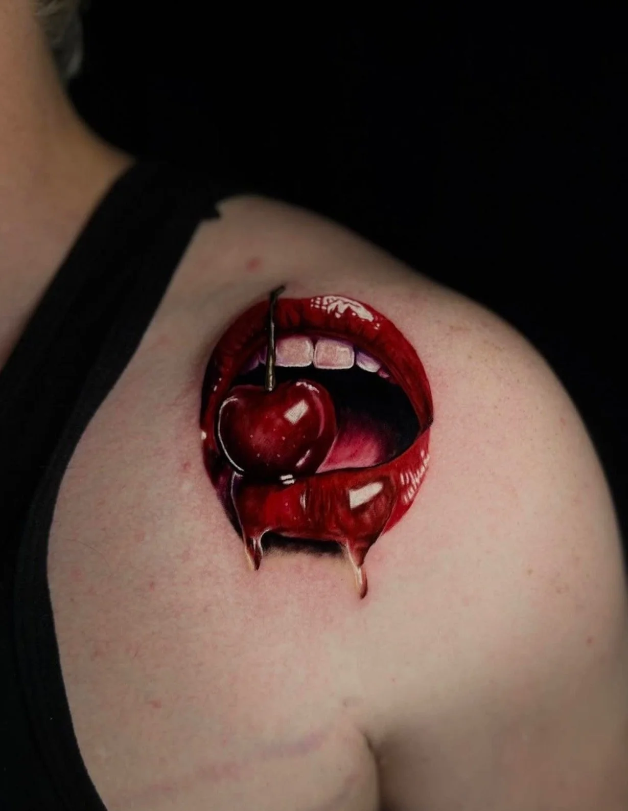 Realistic red lips and cherry tattoo by Ren Giang