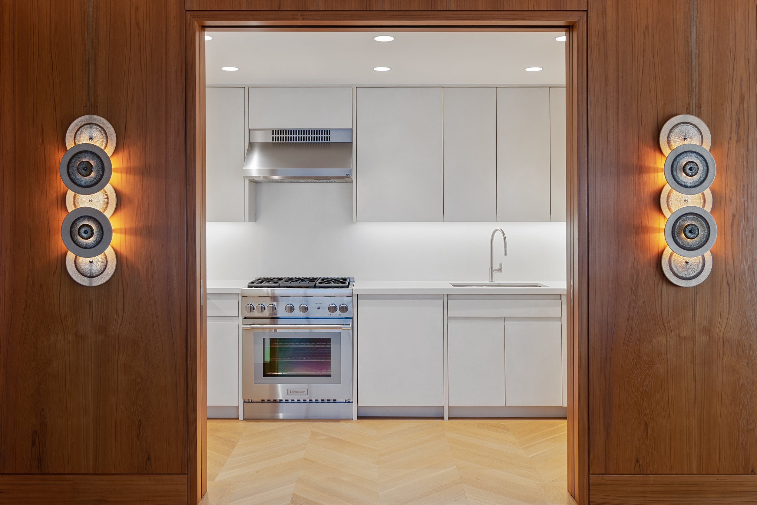 Midcentury Modern kitchen on Park Avenue in New York City by Luay Bahoora Architects
