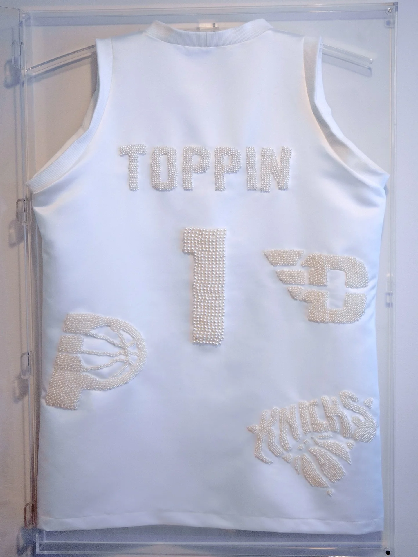 A jersey, reimagined as an heirloom.
Hand-beaded in pearls, fully wearable, and designed to live both on the body and in the home. 

Custom piece created for @obitoppin_1, inspired by @magbellinger. 🤍

I&rsquo;ve been quietly developing a series of 