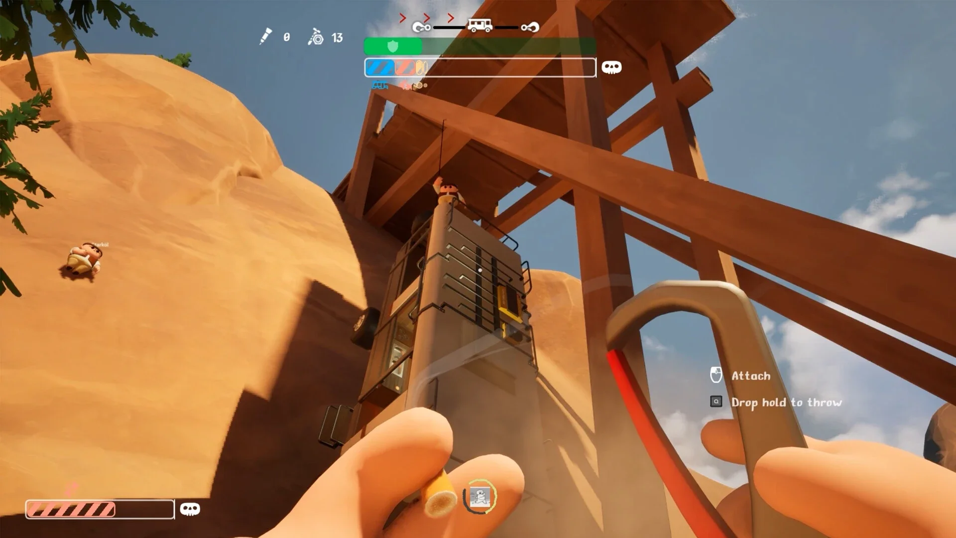 A first-person screenshot from RV There Yet? showing the player aiming a grappling hook at a modular RV that is stuck vertically beneath a wooden scaffold in a stylized desert canyon.