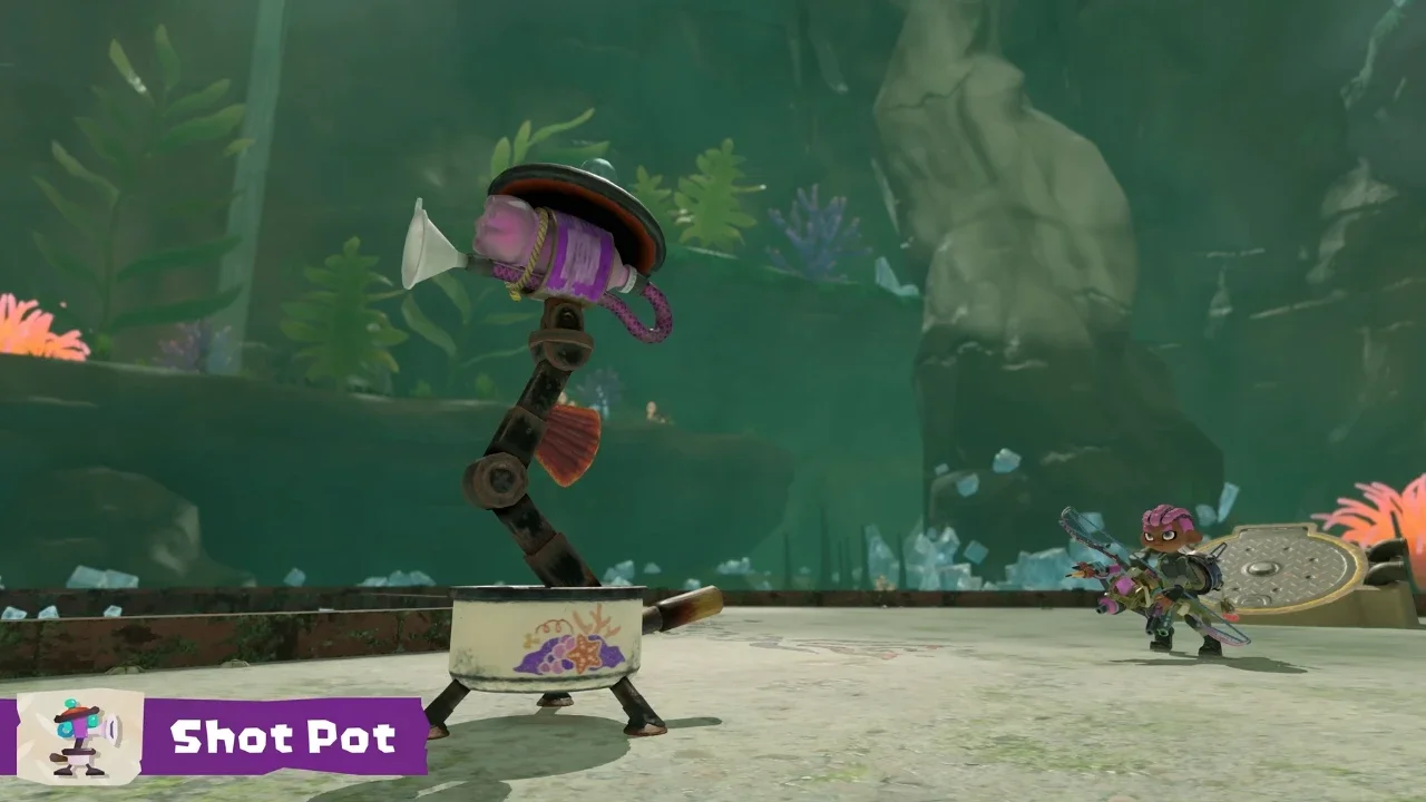 Gameplay screenshot from Splatoon Raiders featuring a tall, mechanical Shot Pot enemy in a greenish underwater cavern with a player character in the background.