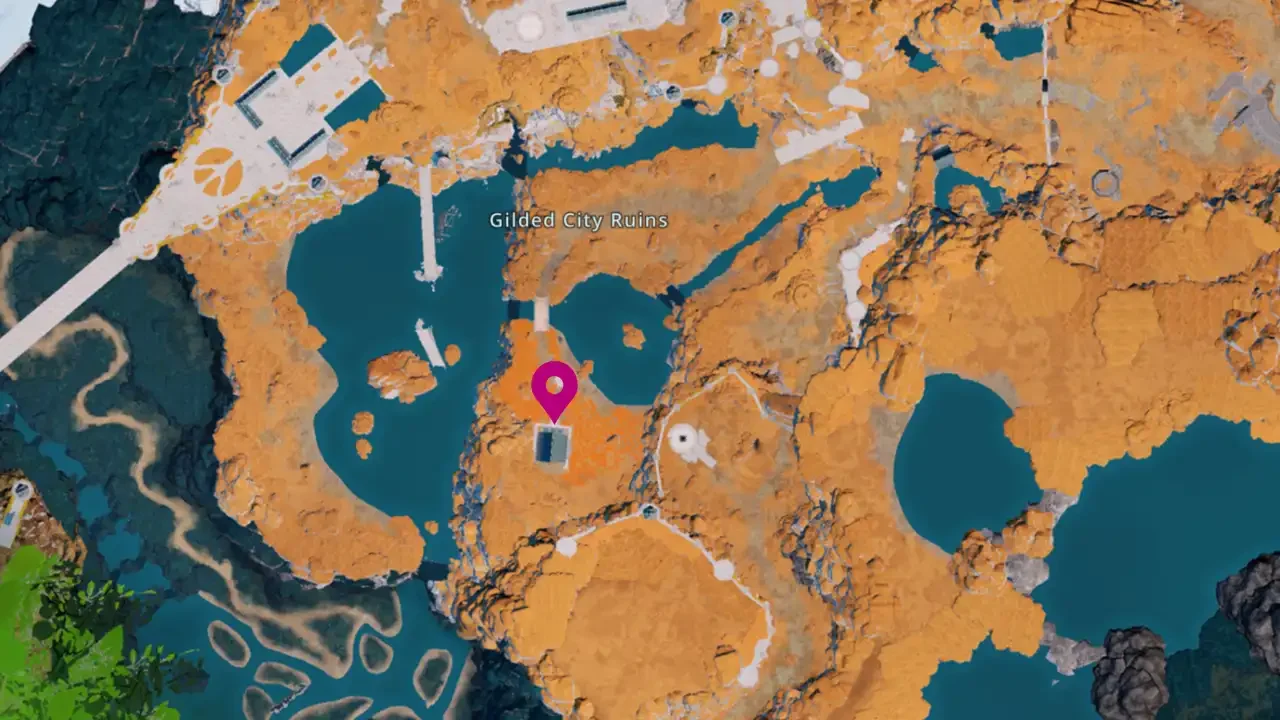 A top-down view of the Palworld in-game map showing the Gilded City Ruins with a pink navigation pin.