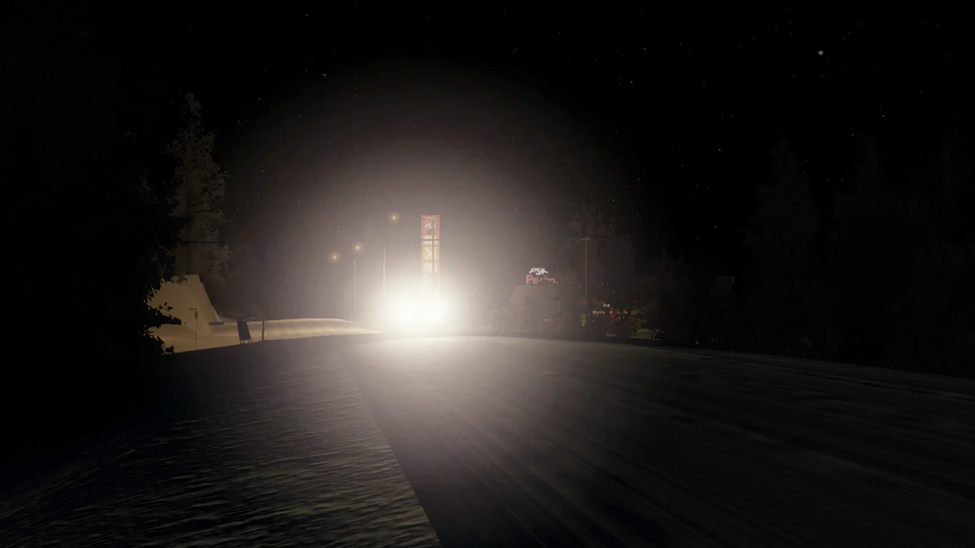 A nighttime screenshot from My Winter Car where intense headlight glare washes out the view of a roadside service station and billboard against a snowy, forested background.
