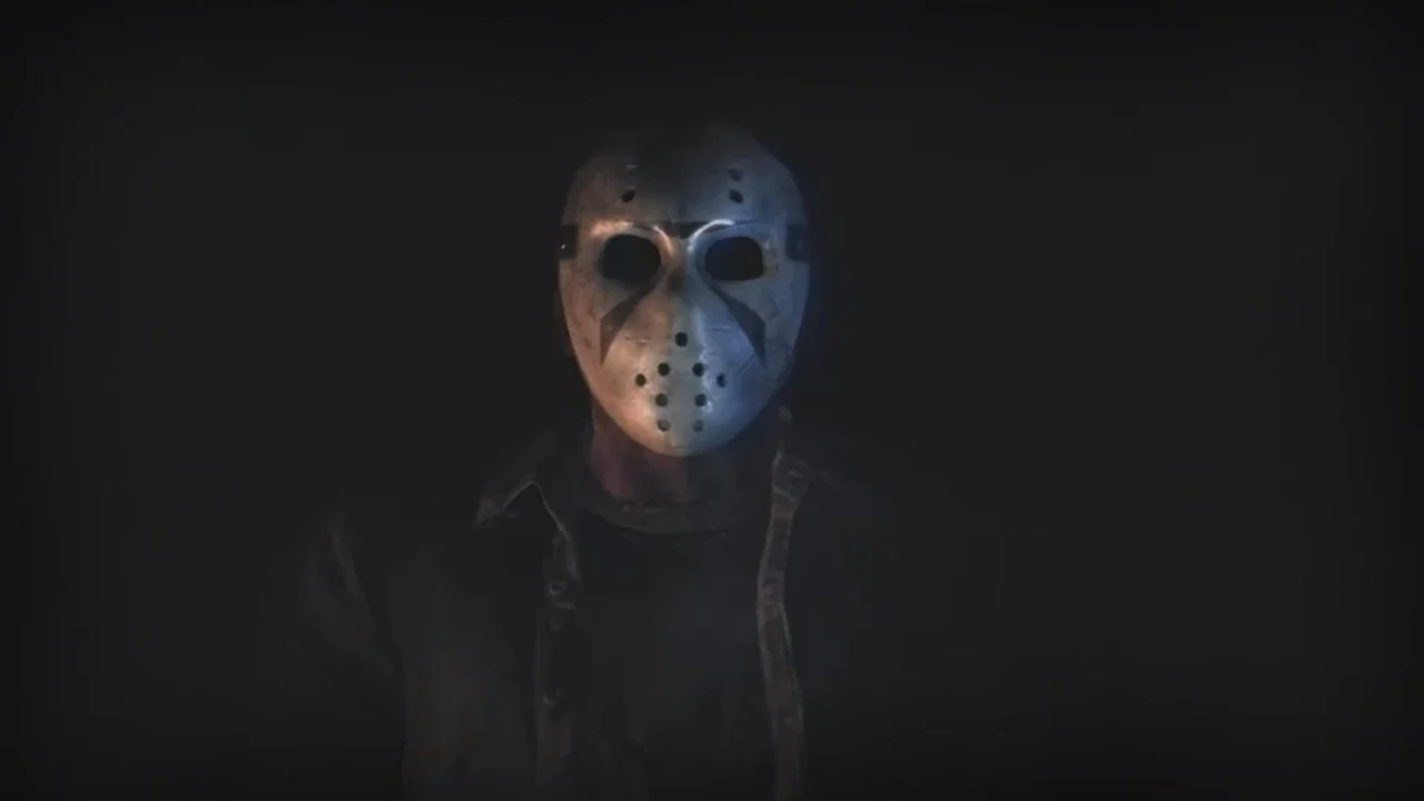 A cinematic close-up of a slasher killer wearing an iconic white hockey mask, emerging from a pitch-black background in a horror gaming setting.
