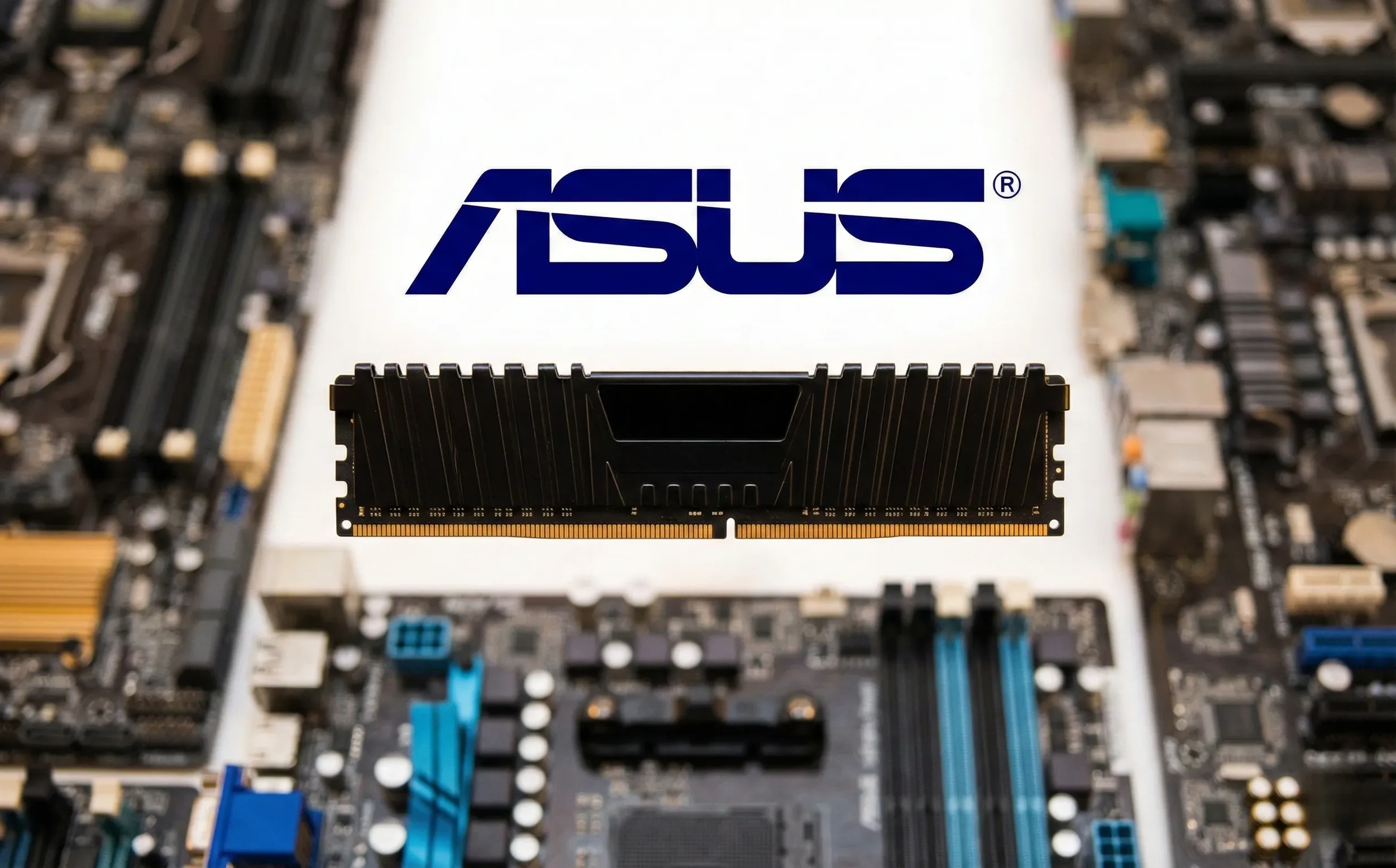 A screenshot from asus featuring a black RAM module with a heat spreader centered against the blue ASUS logo, framed by blurred computer motherboards.