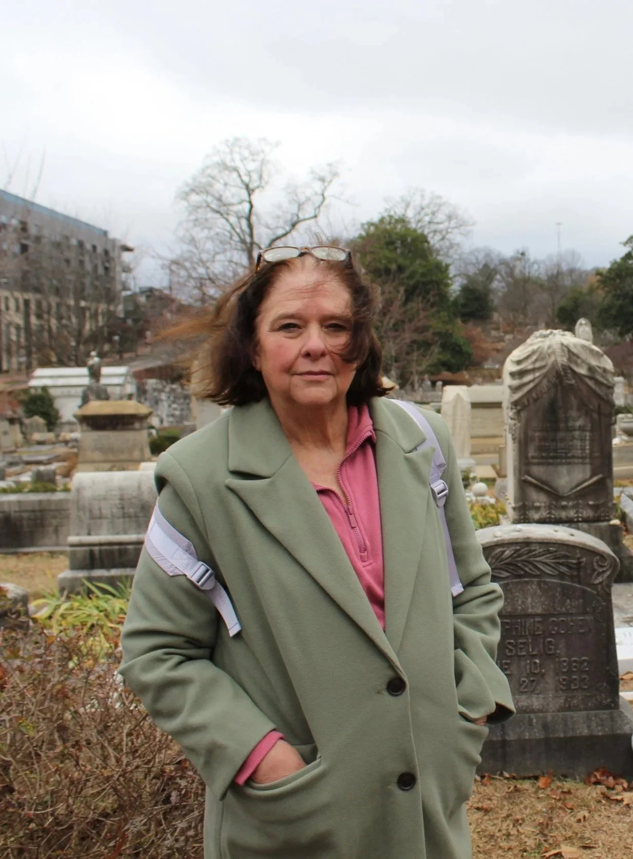 author Ann Hite standing in a graveyard