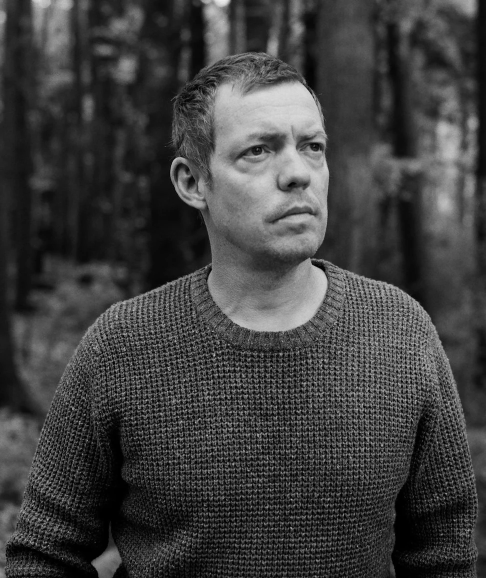Michael Wehunt standing in front of trees.