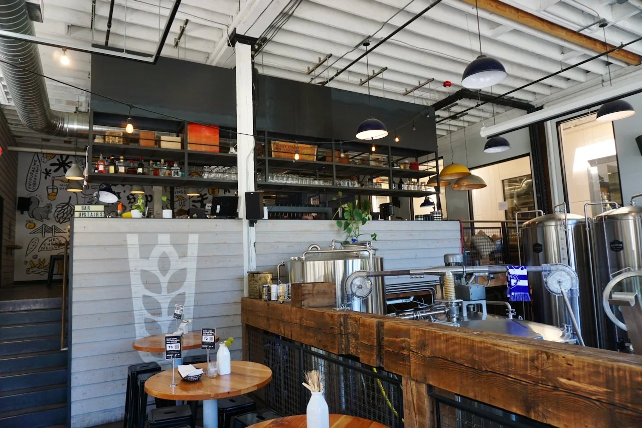  the lower entry level dining area looking up to the loft area bar at Grand Fir Brewing 