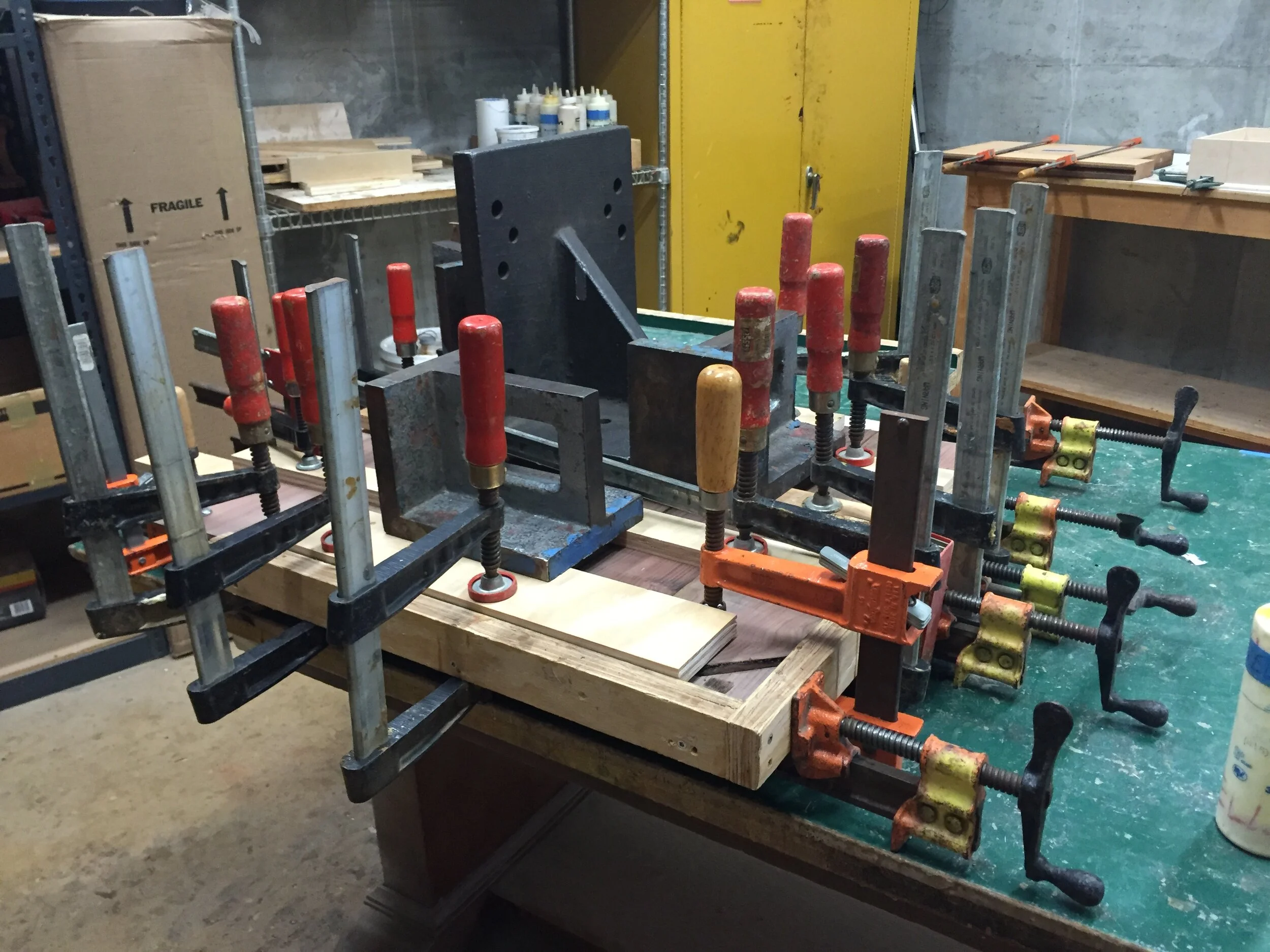 Glueing process of making my walnut “plywood”  (side view)