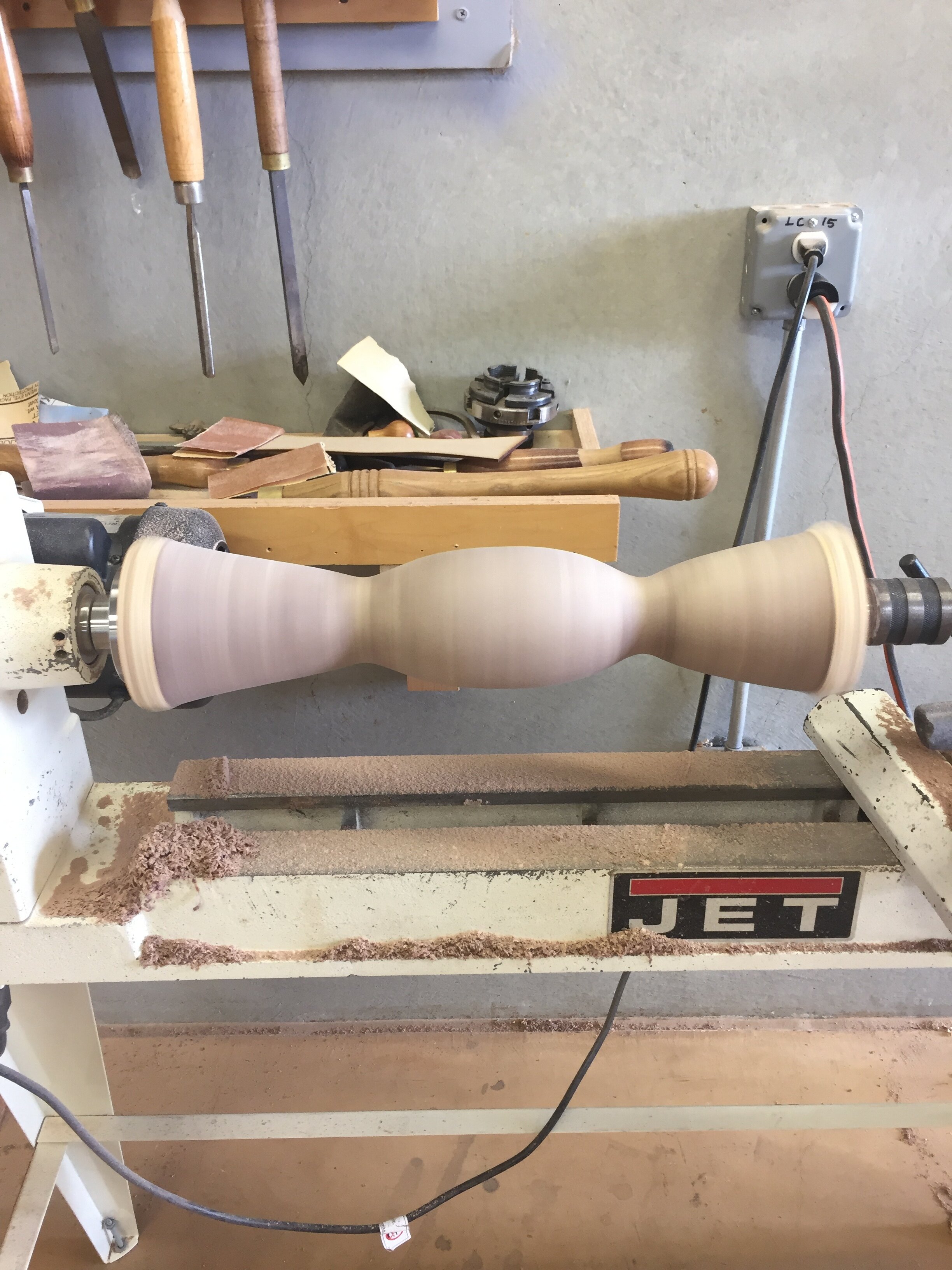 Center table shaft turning on lathe