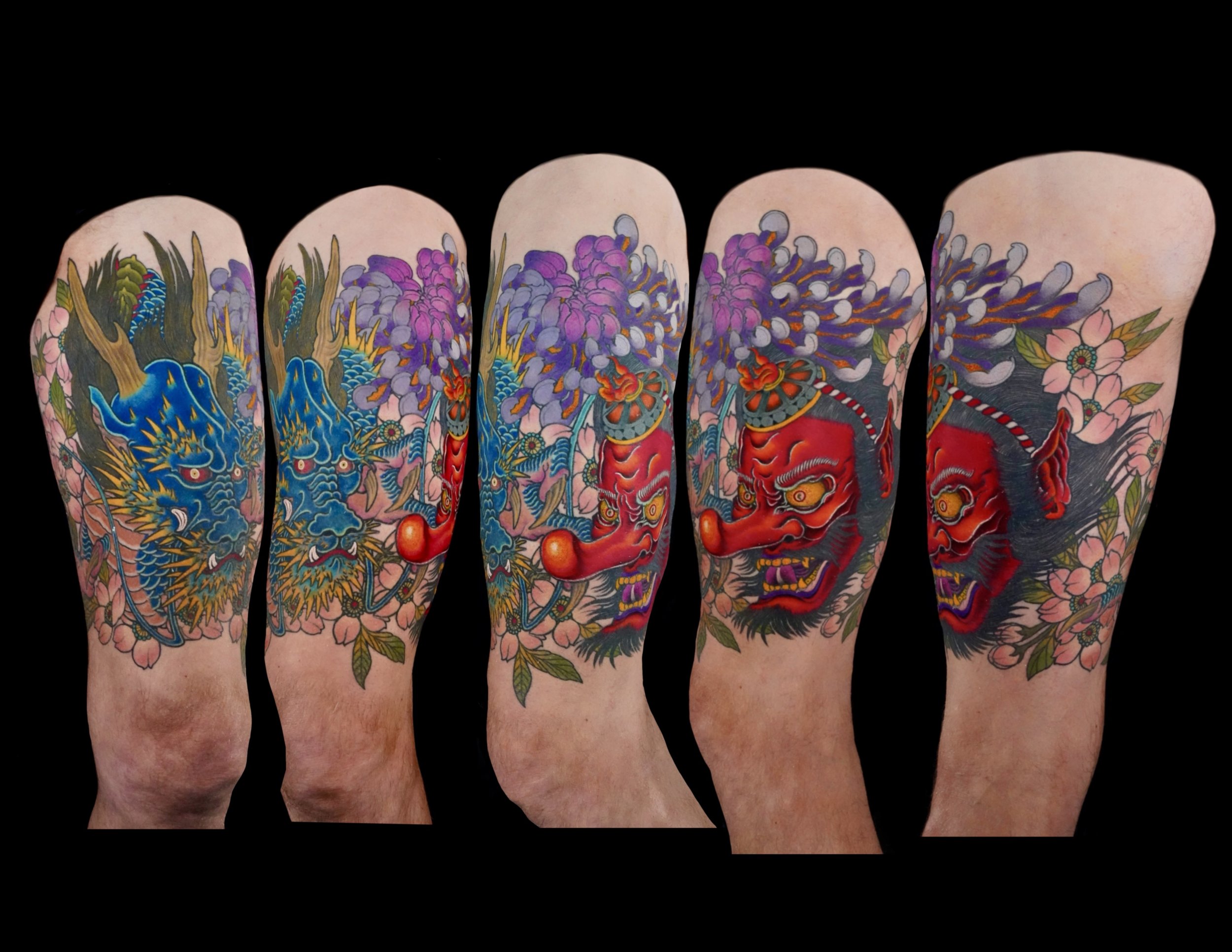 Colorful traditional Japanese tattoo featuring a dragon on the left arm and a Hannya mask on the right arm, surrounded by flowers.