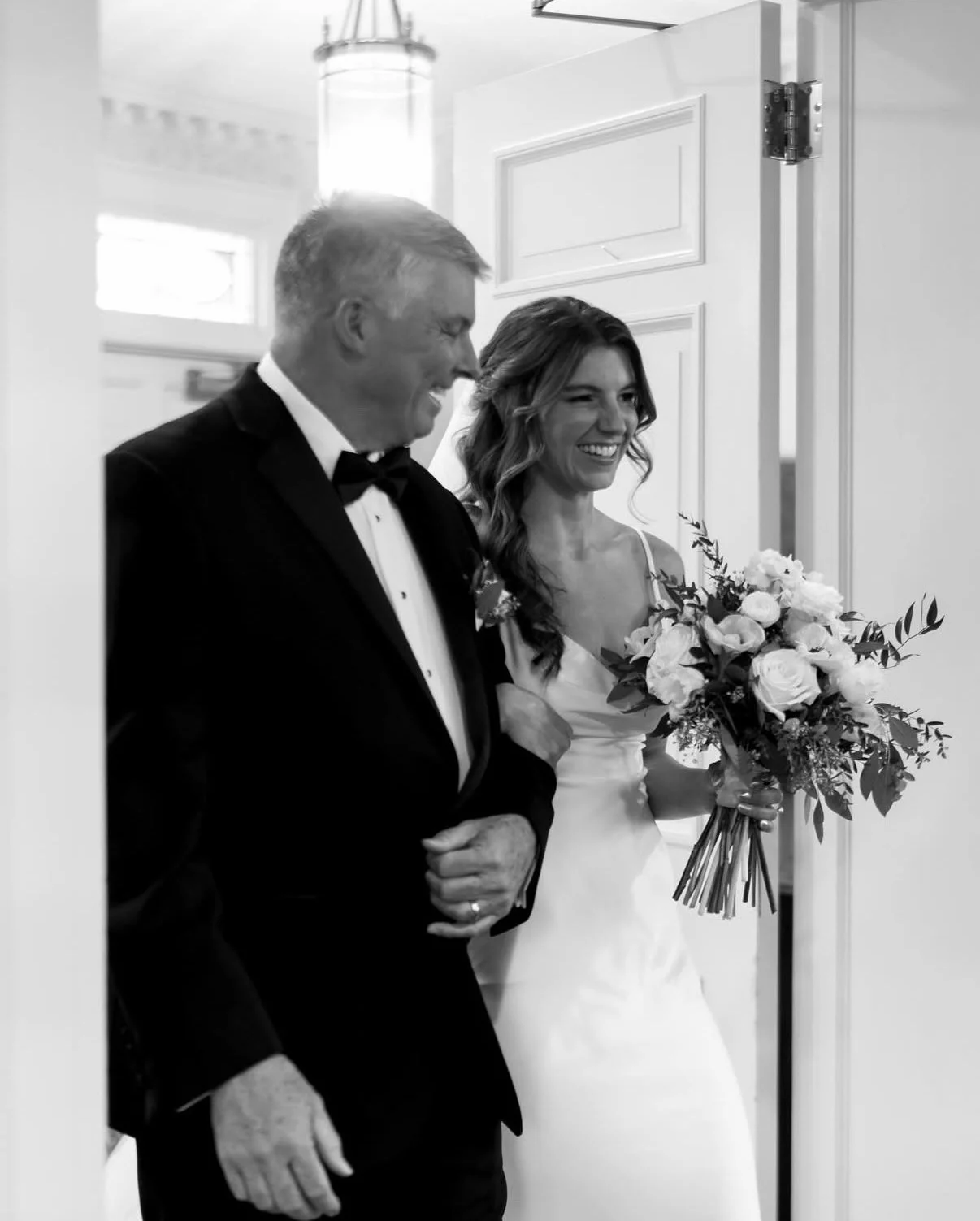 father of the bride walking his daughter down the isle