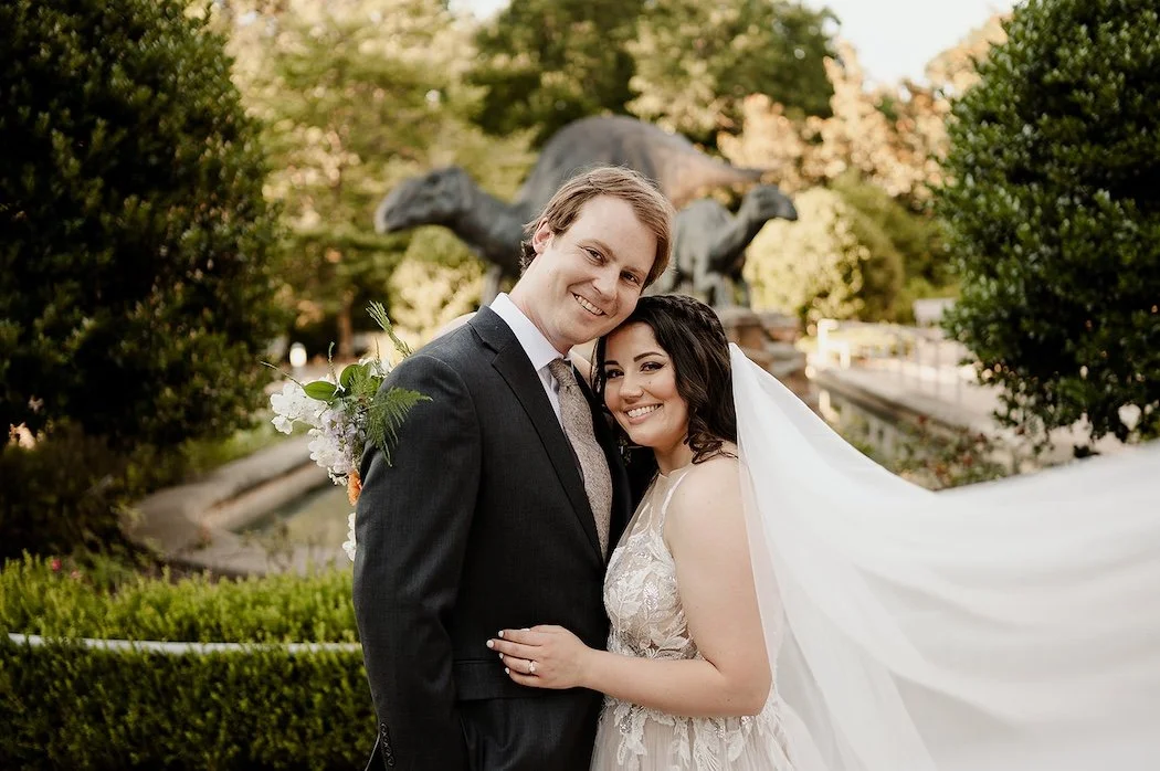 bride and groom outside the fernbank museum
