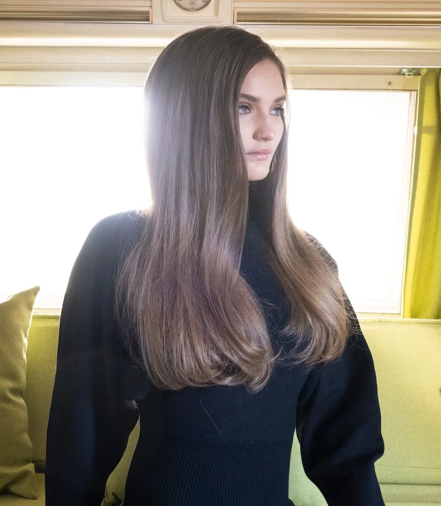 sleek down hair style for a commercial shoot