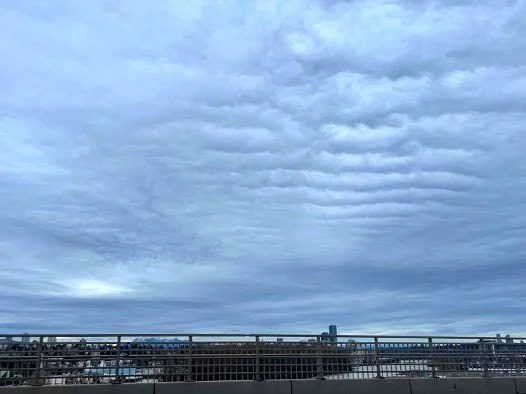rumpled clouds that look like a bed quilt