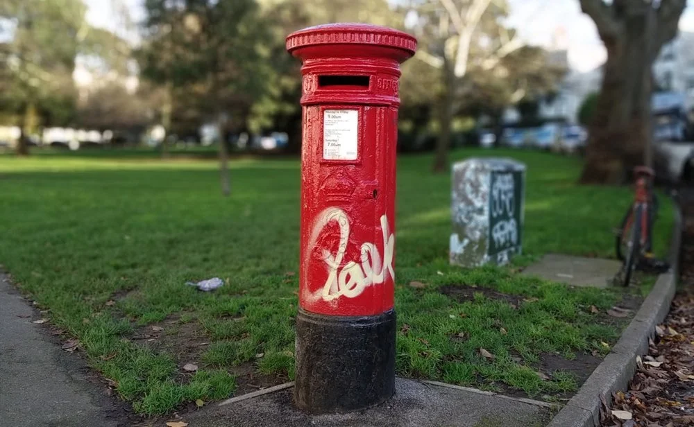 red letterbox for Alleyhats shipping options