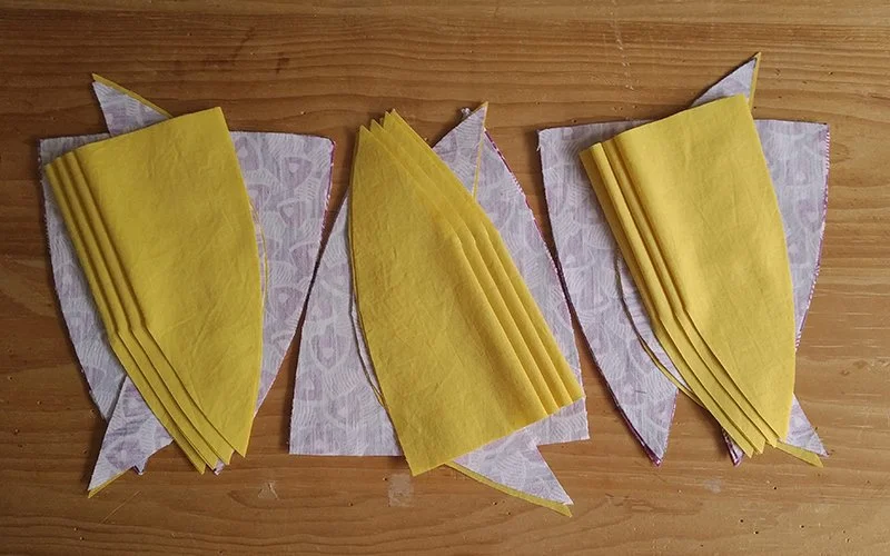 cycle cap fabric pieces cut out