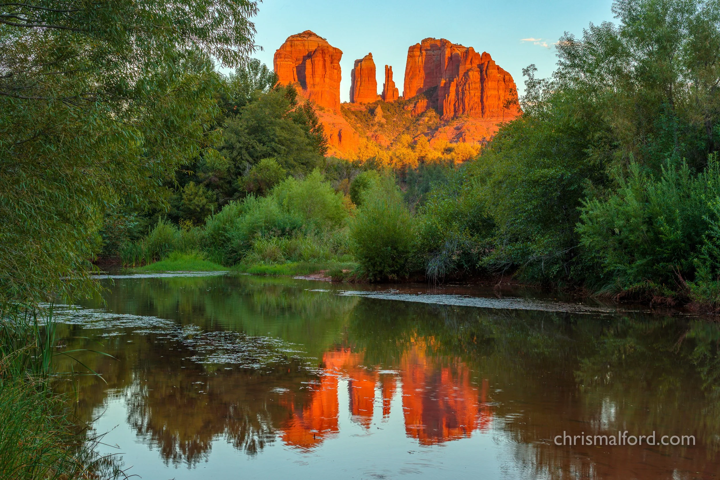 portfolio-sunset-at-cathedral-with-reflection-in-sedona-arizona-photograph-by-chris-alford.jpg