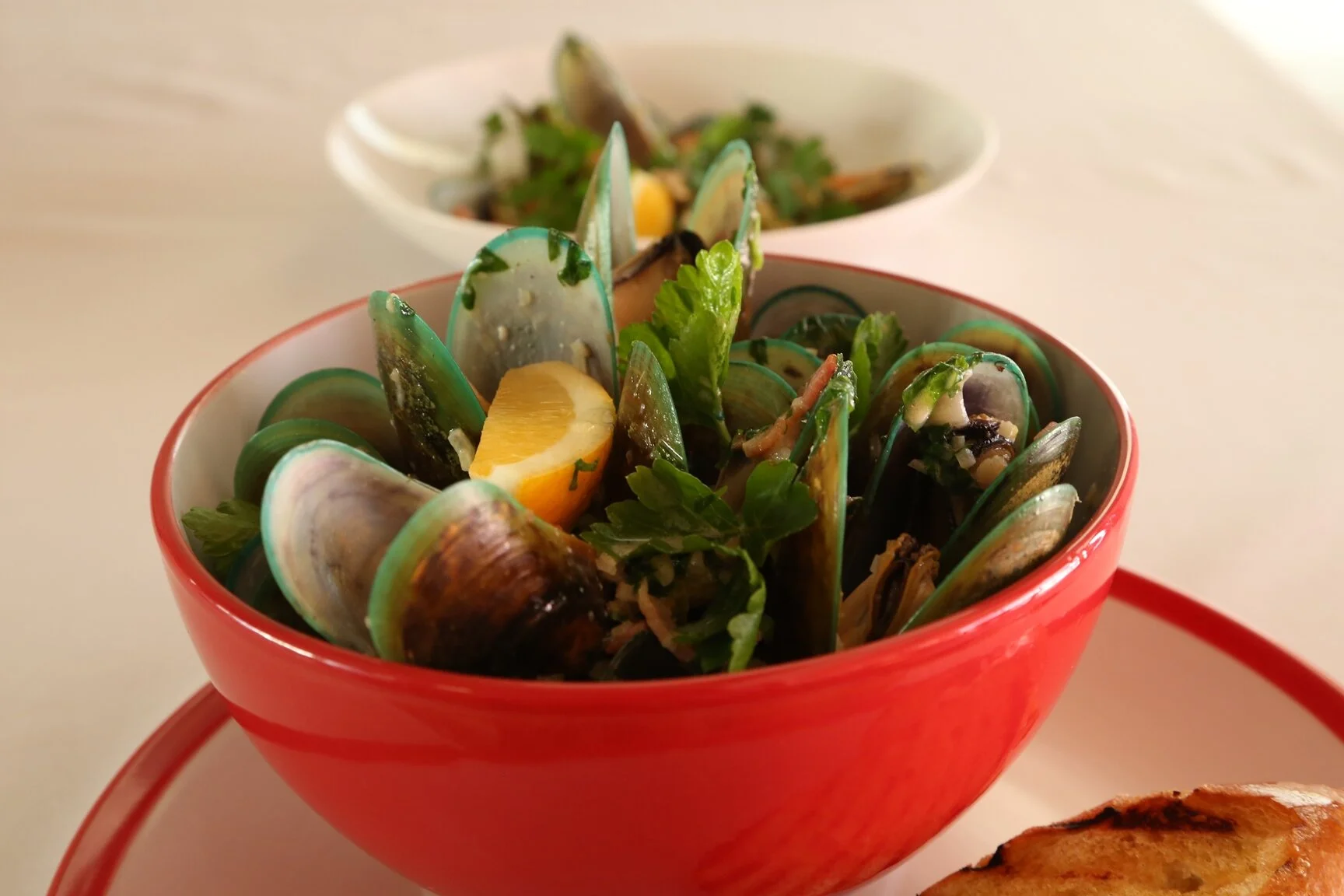 Steamed NZ Greenshell mussels with white wine, celery, bacon and cream