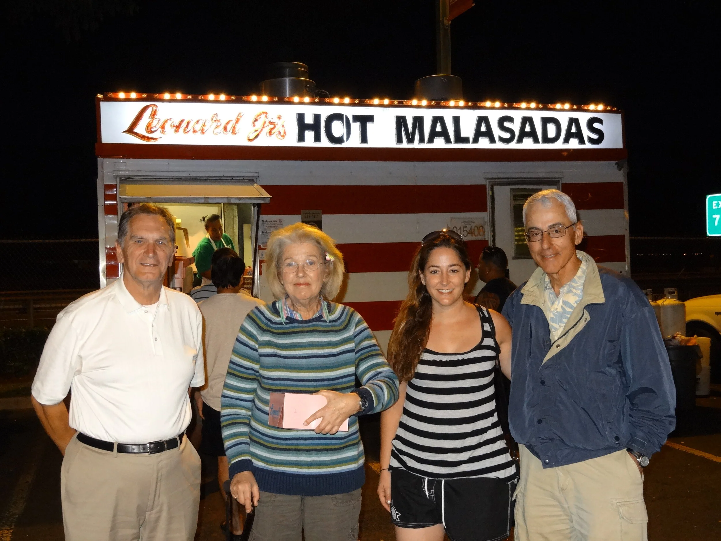 All smiles with my fam and fresh malasadas... Custard filled of course!