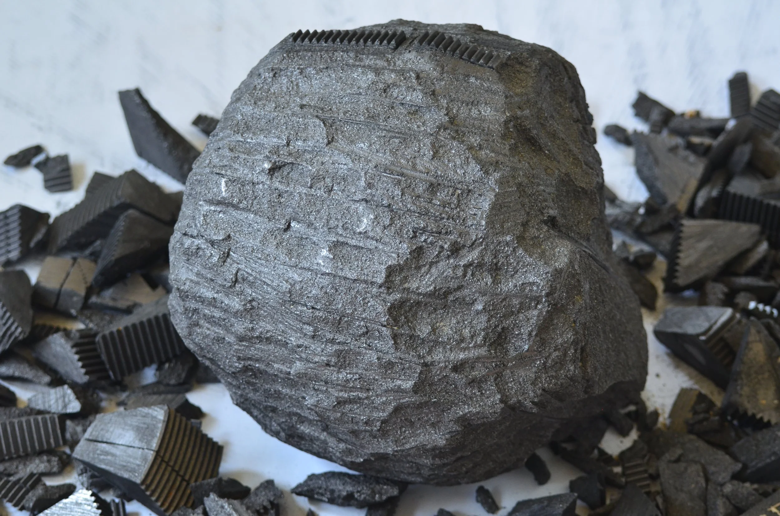 Graphite Boulder and debitage.JPG