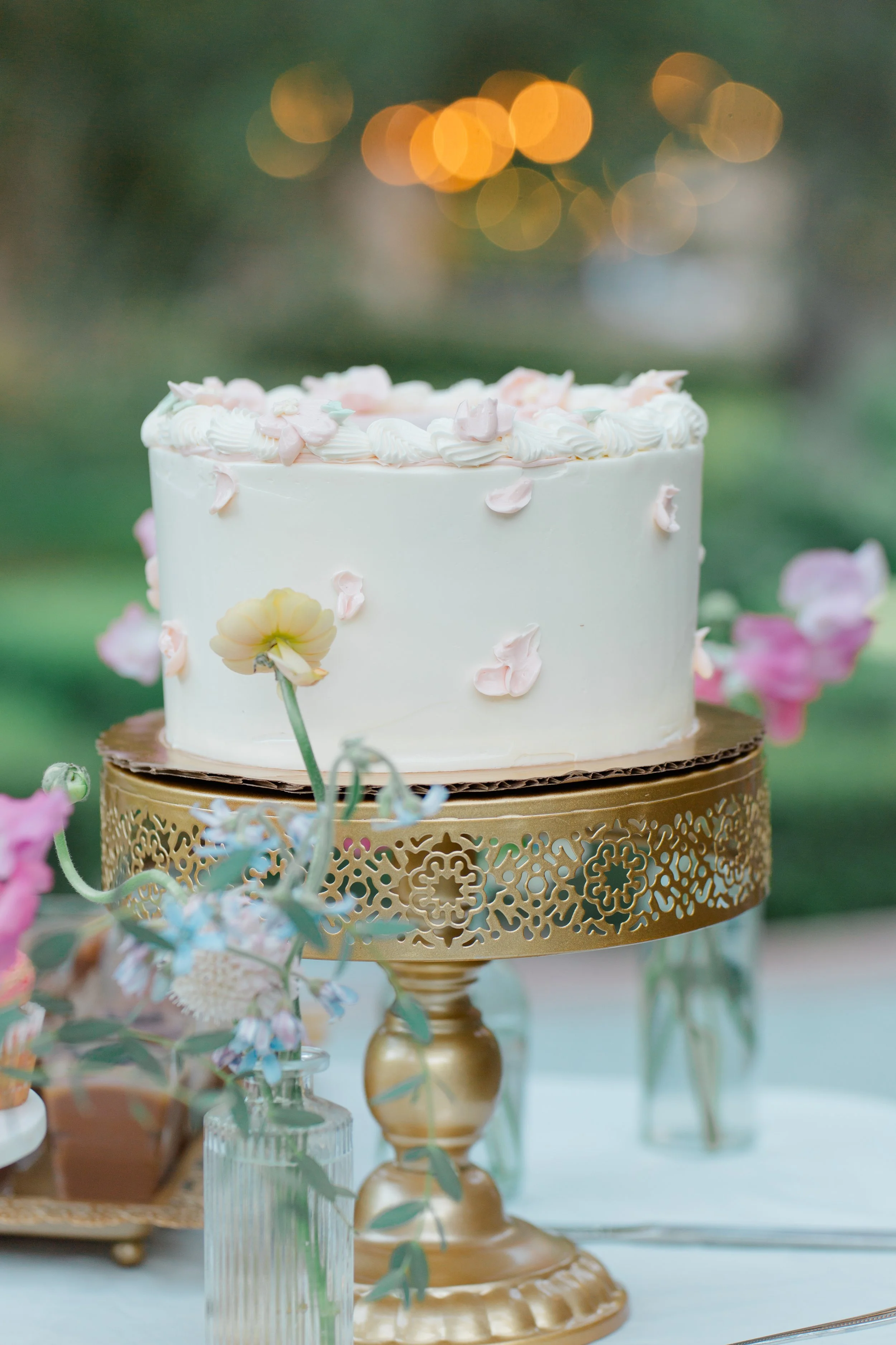 minimalist bridgerton cake at a whimsical wedding