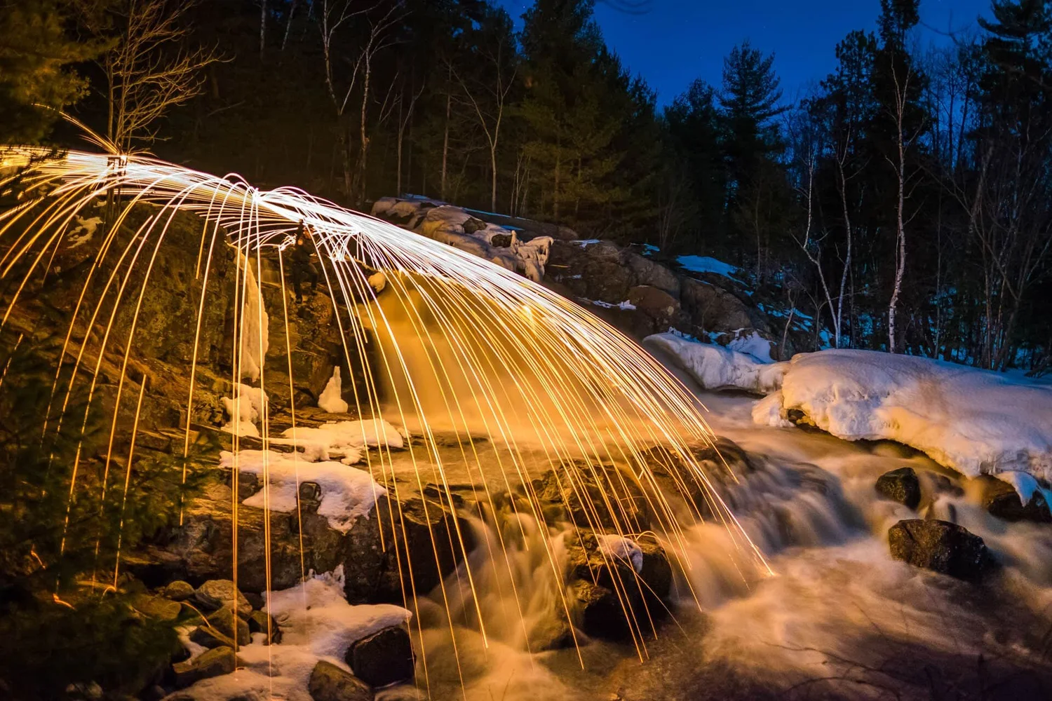 Steel wool long exposure — flashlights used on waterfall