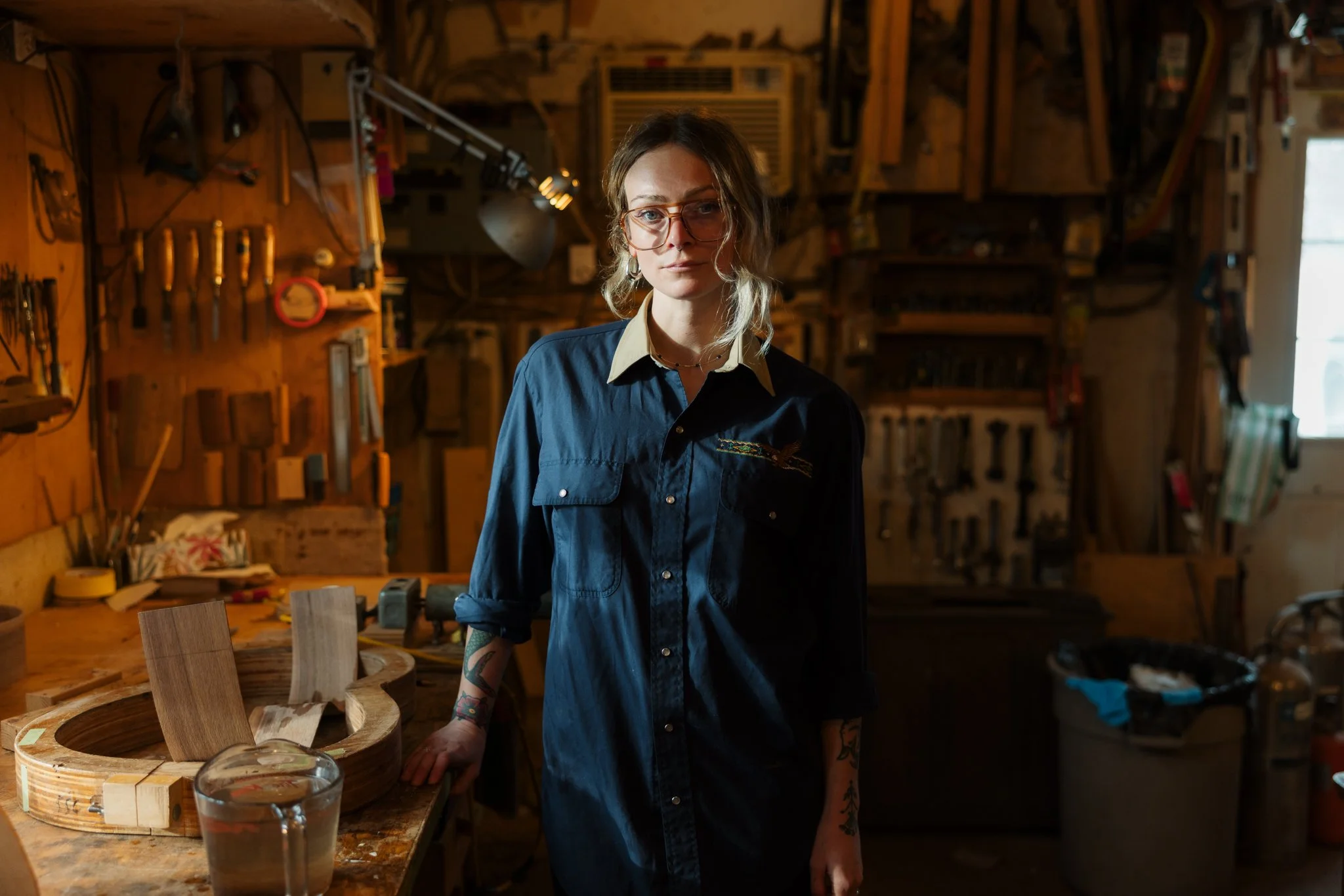 Grace — profile over the workbench