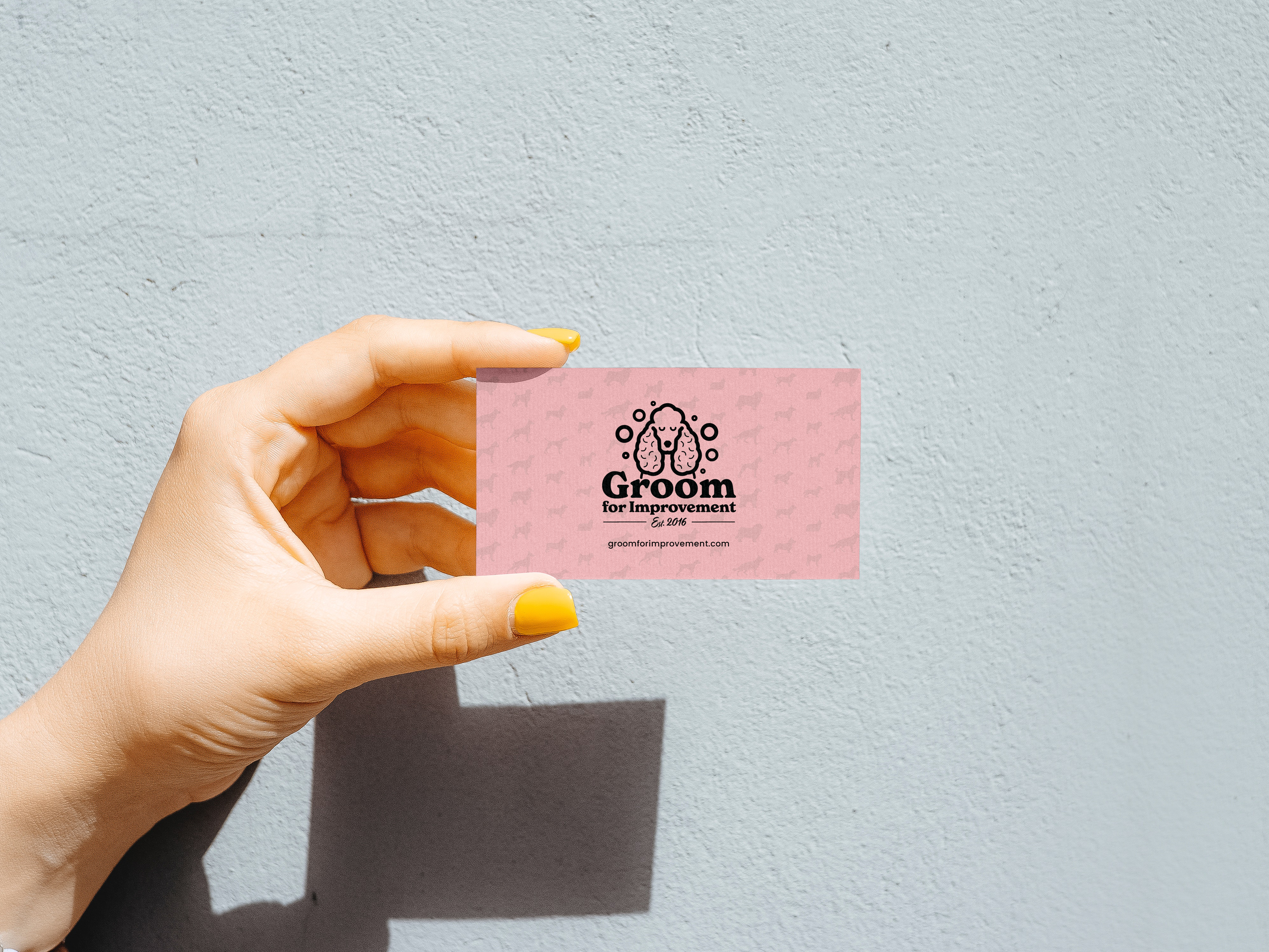 GFI_business_card_with_hand.png