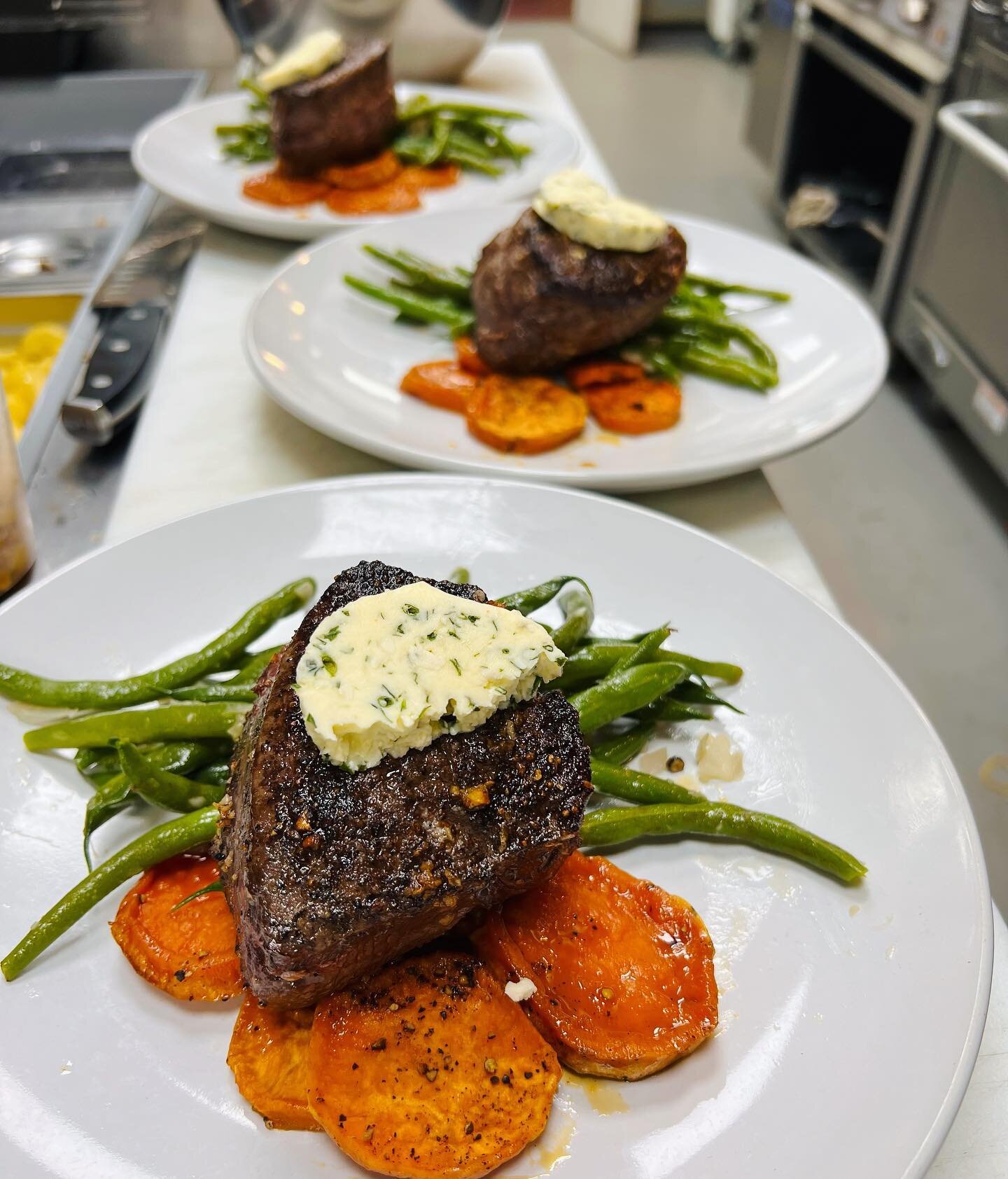Seared baseball sirloin served with lemon sorghum glaze sweet potato, snap beens with caramelized shallots, and topped Gorgonzola herb butter