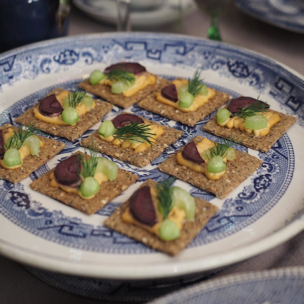 blue china with raw food snacks