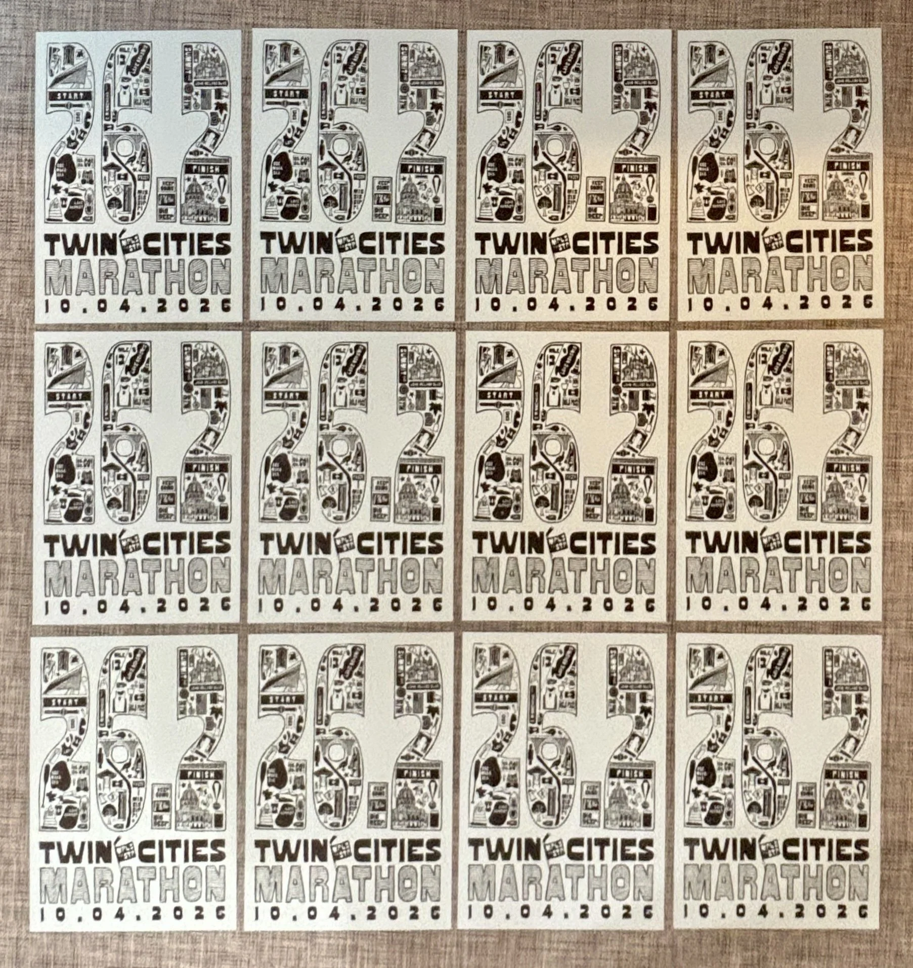Multiple prints from the Twin Cities Marathon poster edition arranged in rows