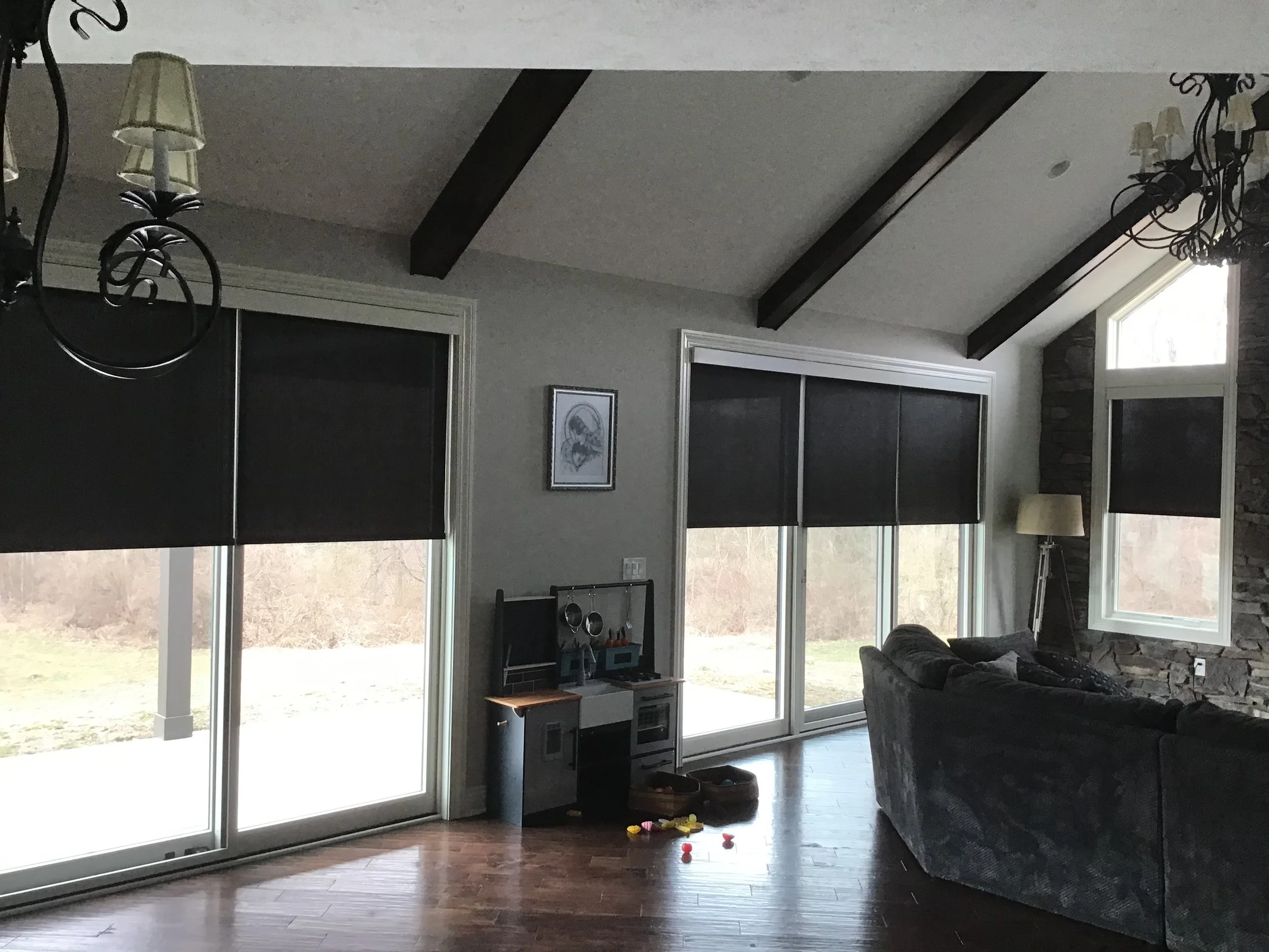 motorized roller shades over patio doors