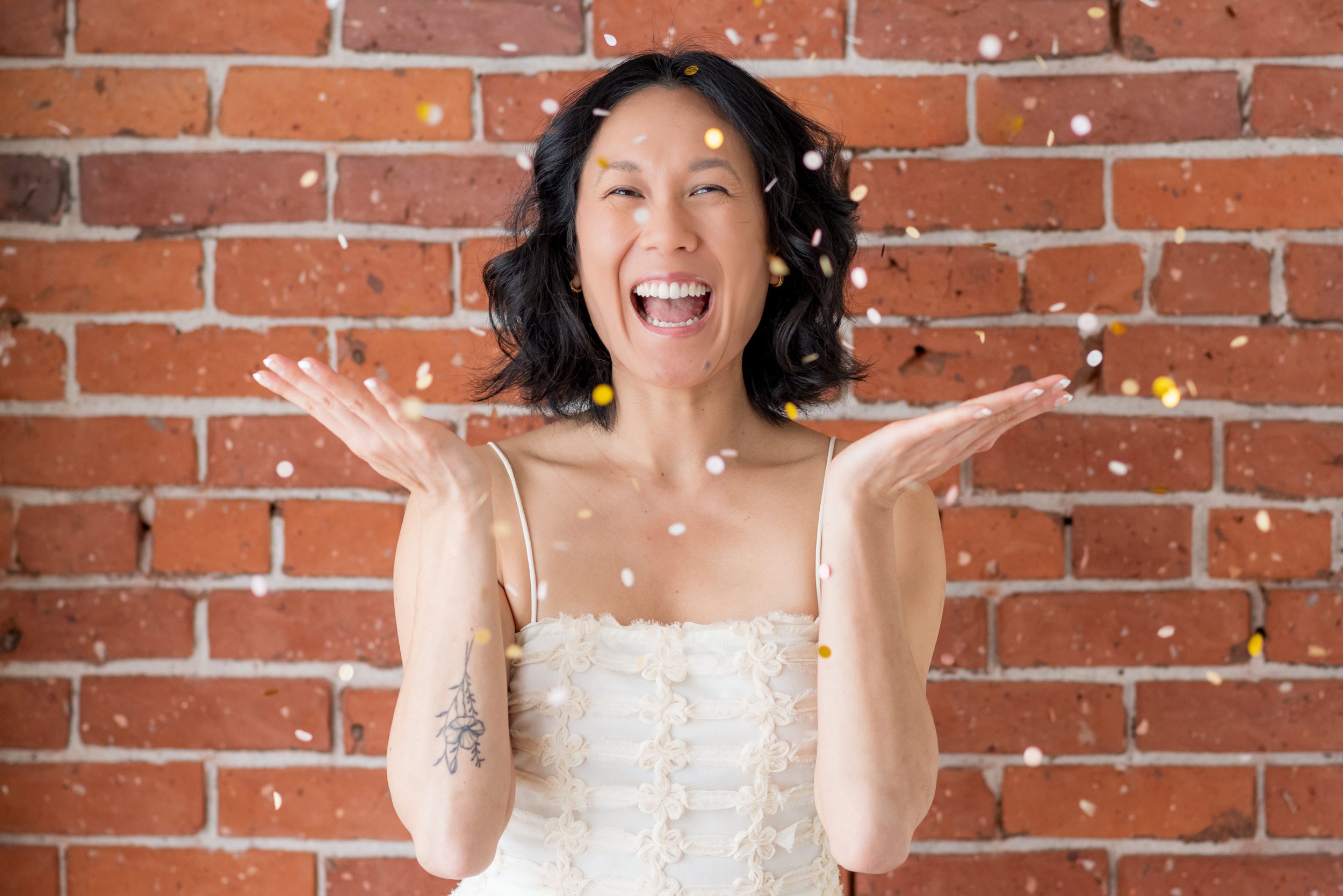 female-business-owner-confetti-celebration-brand-photoshoot-san-diego.jpg