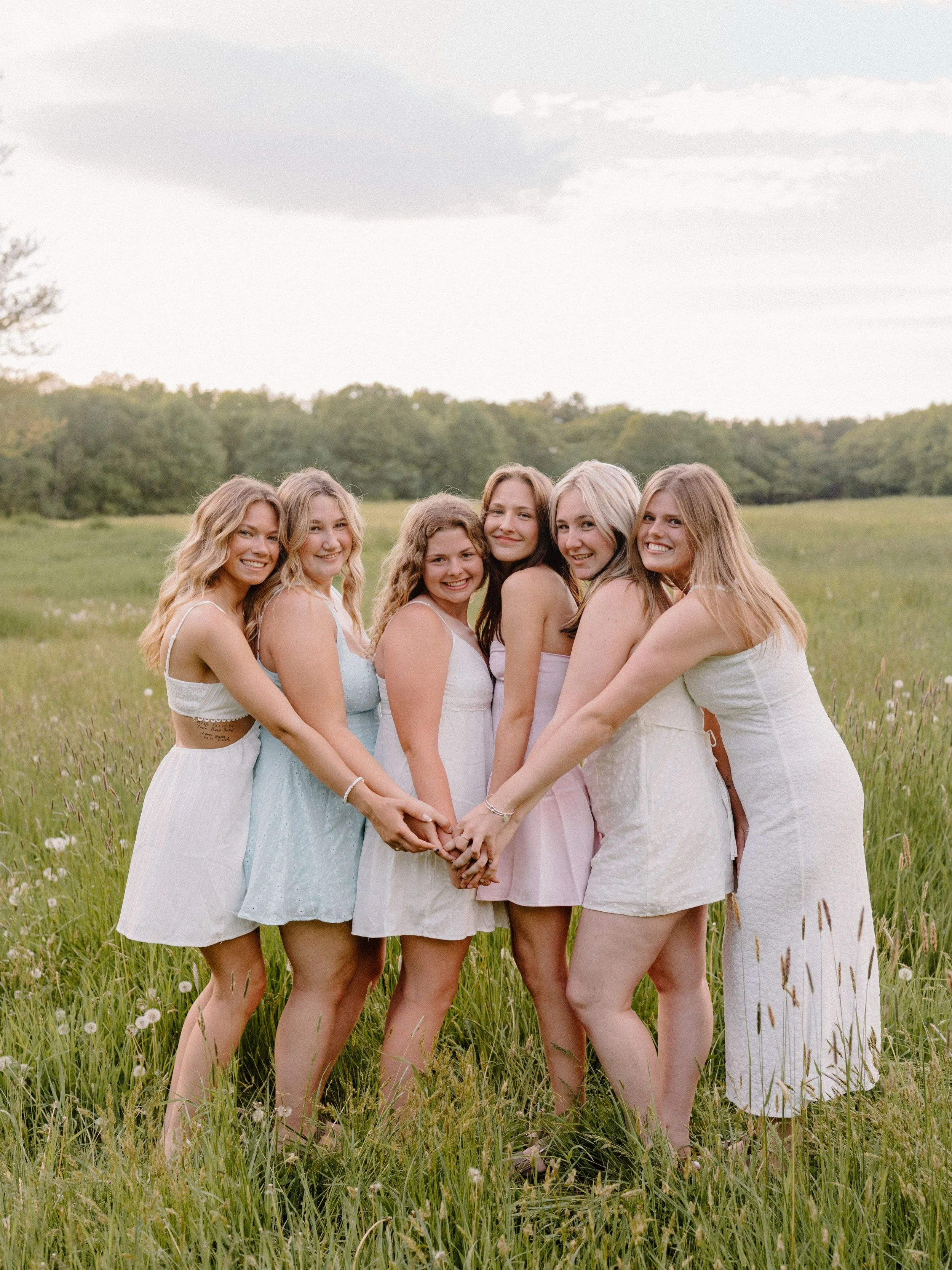 One of the sweetest ways to celebrate senior year entails gathering your best friends and making some memories before graduation! These girls spent the evening running through the fields, laughing, chasing golden hour, and celebrating this exciting s
