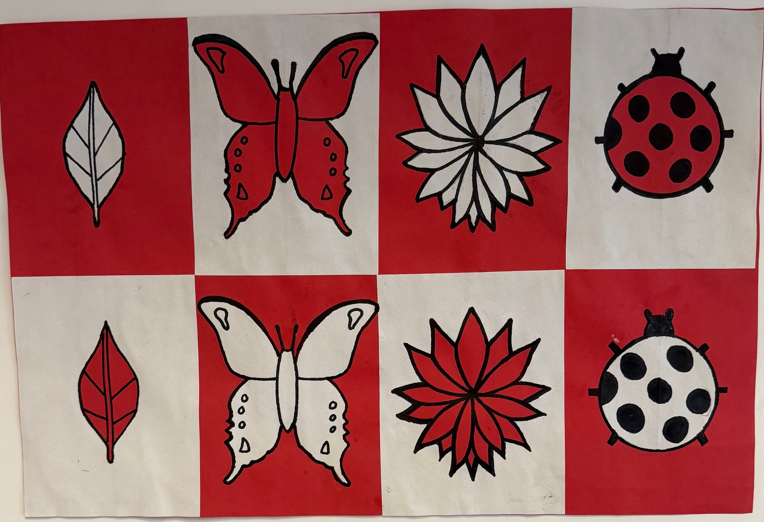 Kamilla Velazquez, 8th, Positive Negative Design, Colored Construction Paper and Sharpie