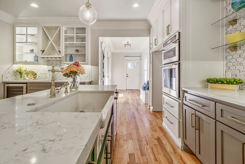 a kitchen with a sink and a window