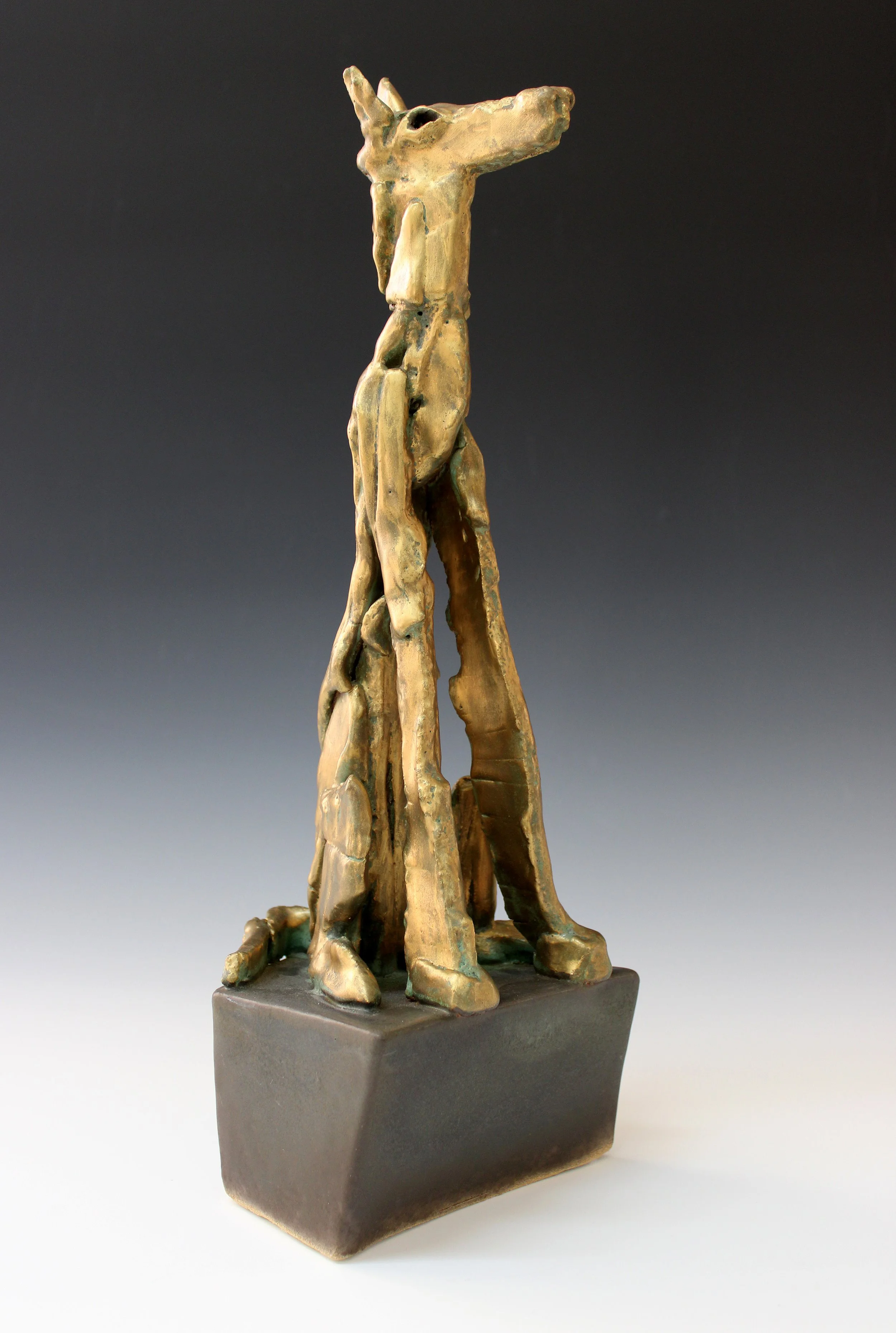 Jeff Downing
Aurelia
Pedestal, ceramic stoneware with bronze glaze, metallic wax.
17" x 6" x 6"
2026
$700.00